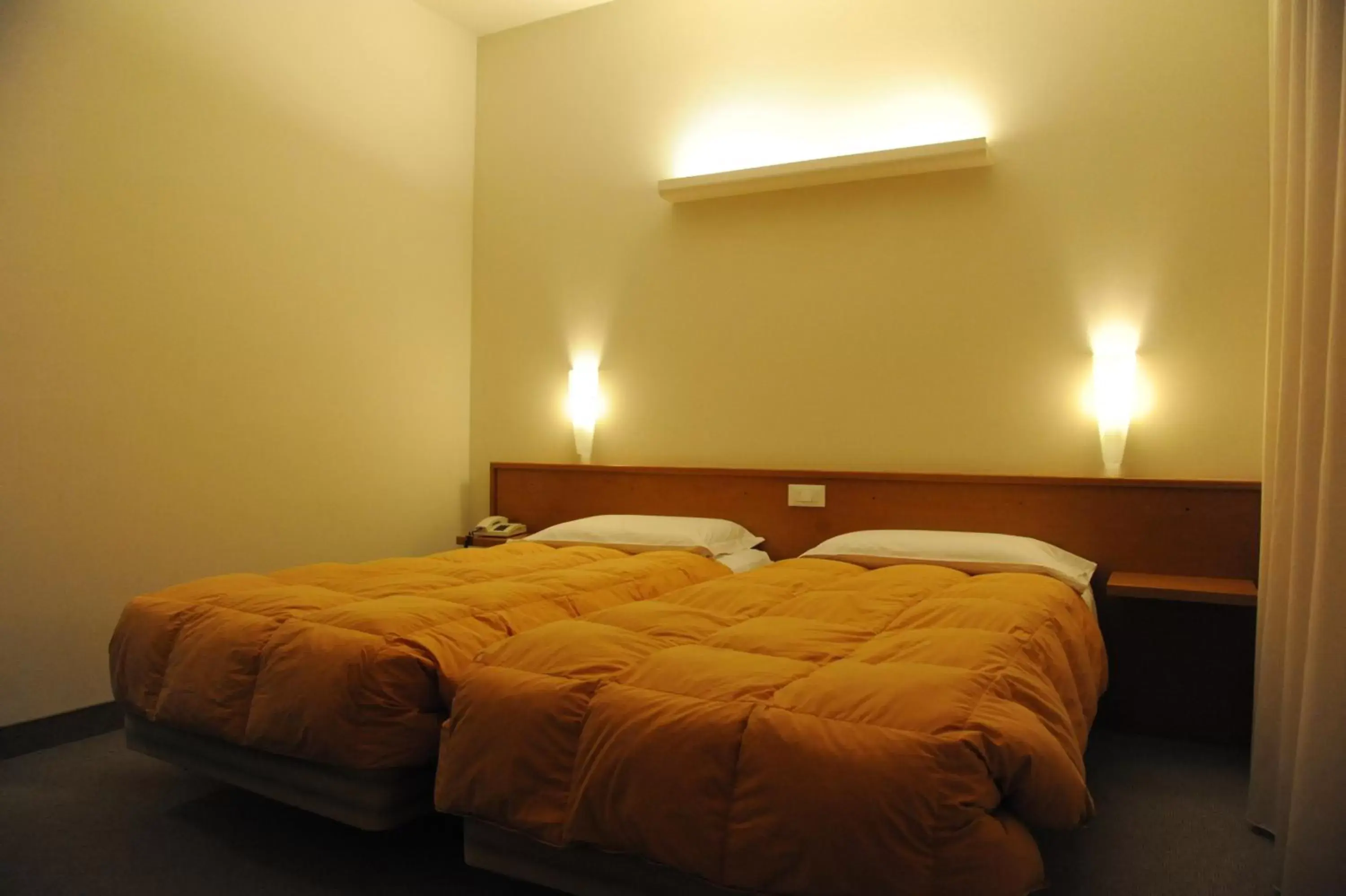 Bed in Albergo Al Sole