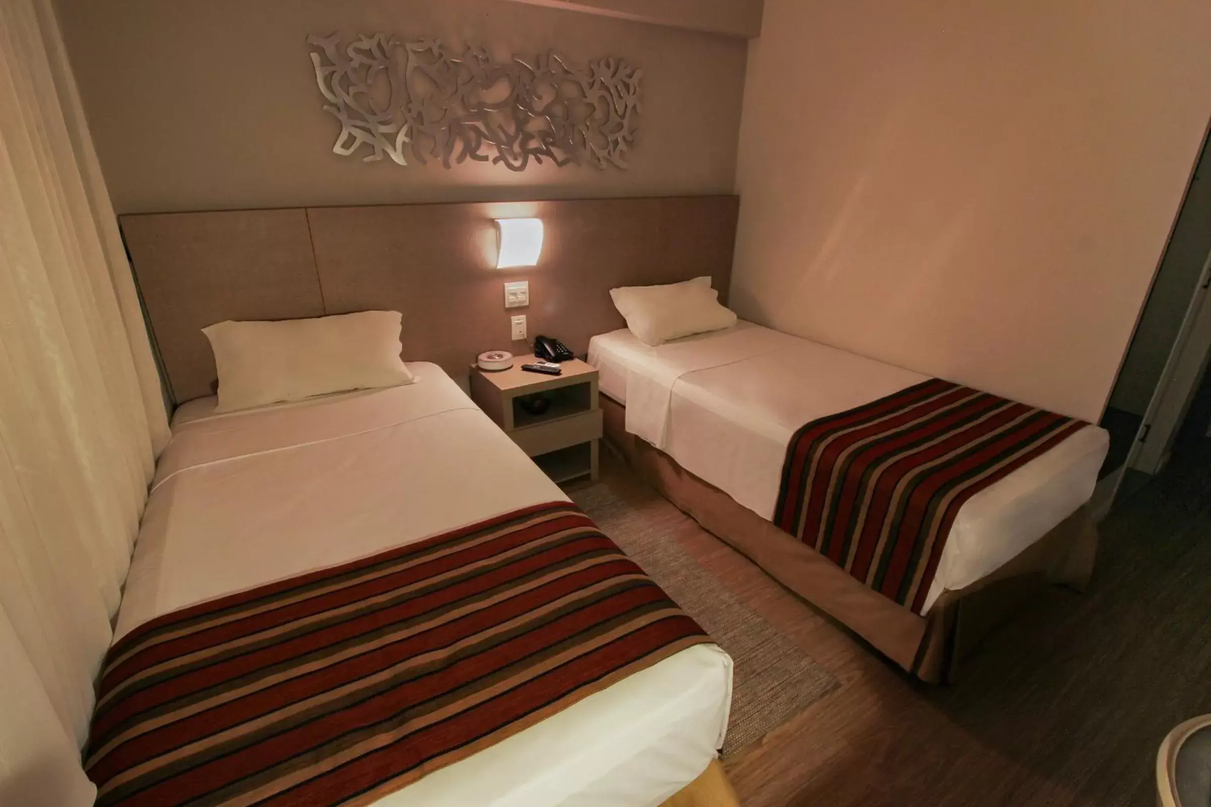 Photo of the whole room, Bed in Hotel Beaga Convention Expominas by MHB
