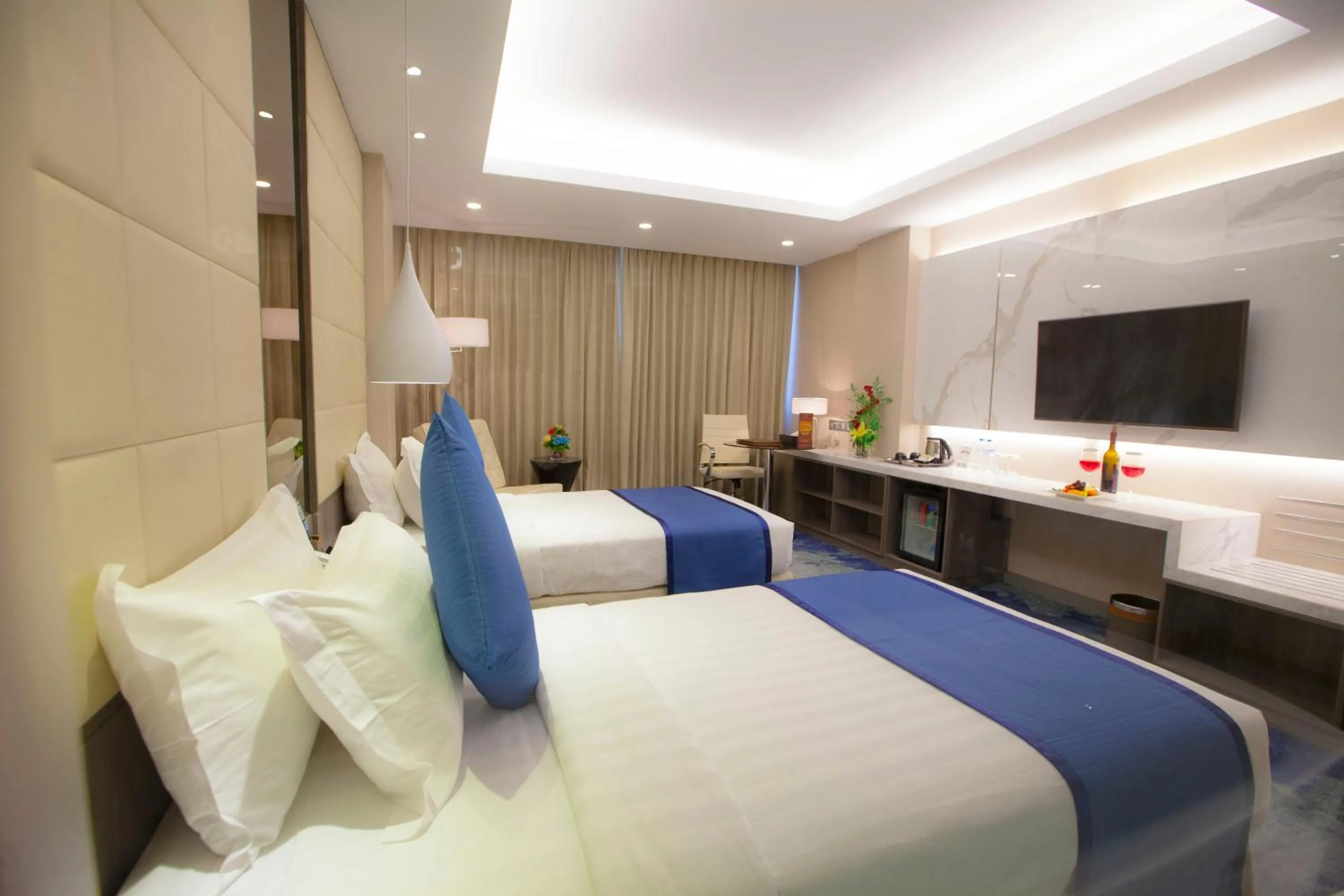 Bed in Grand Palace Hotel