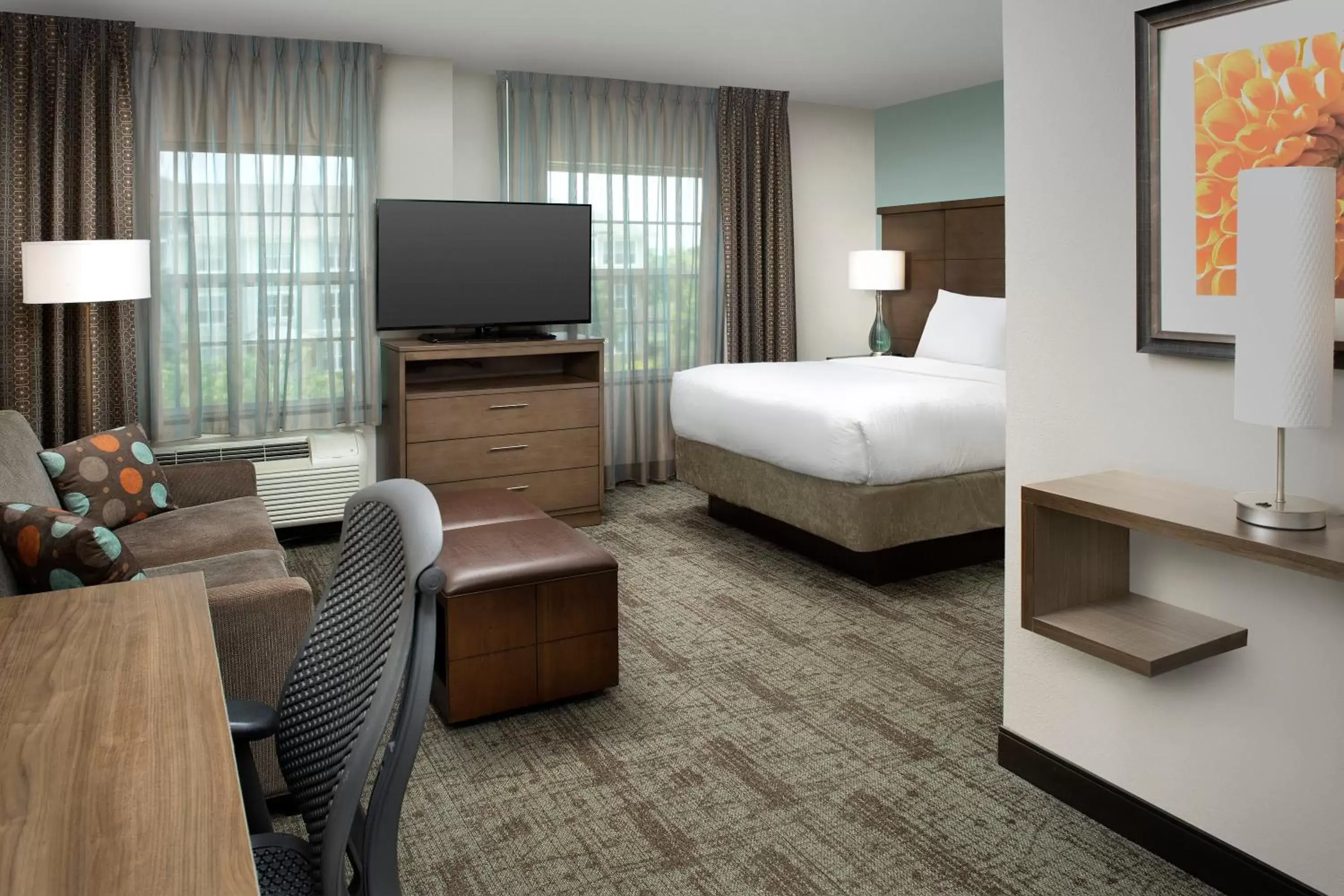 Photo of the whole room, TV/Entertainment Center in Staybridge Suites Greenville I-85 Woodruff Road, an IHG Hotel