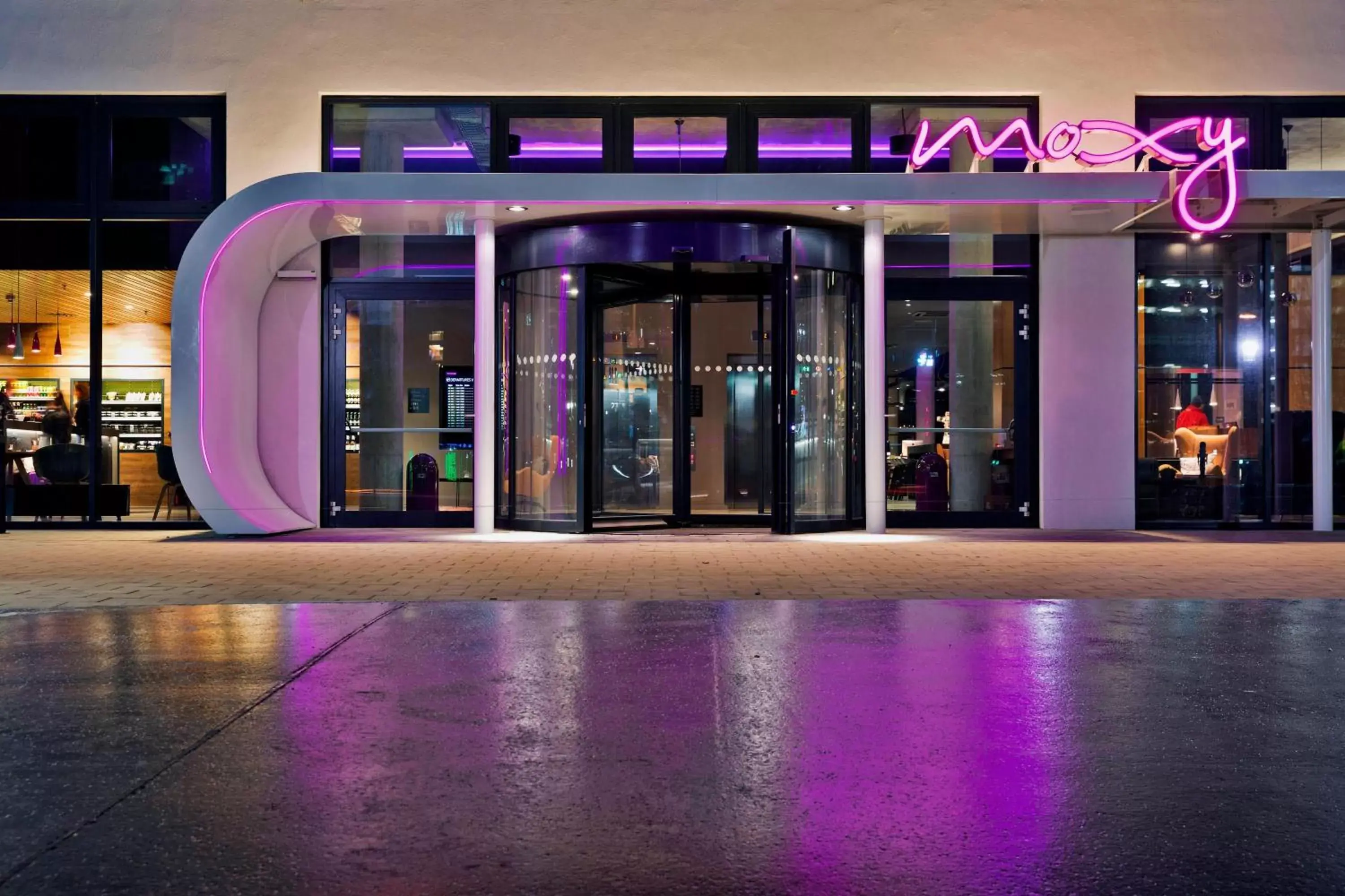 Property building, Swimming Pool in MOXY Vienna Airport
