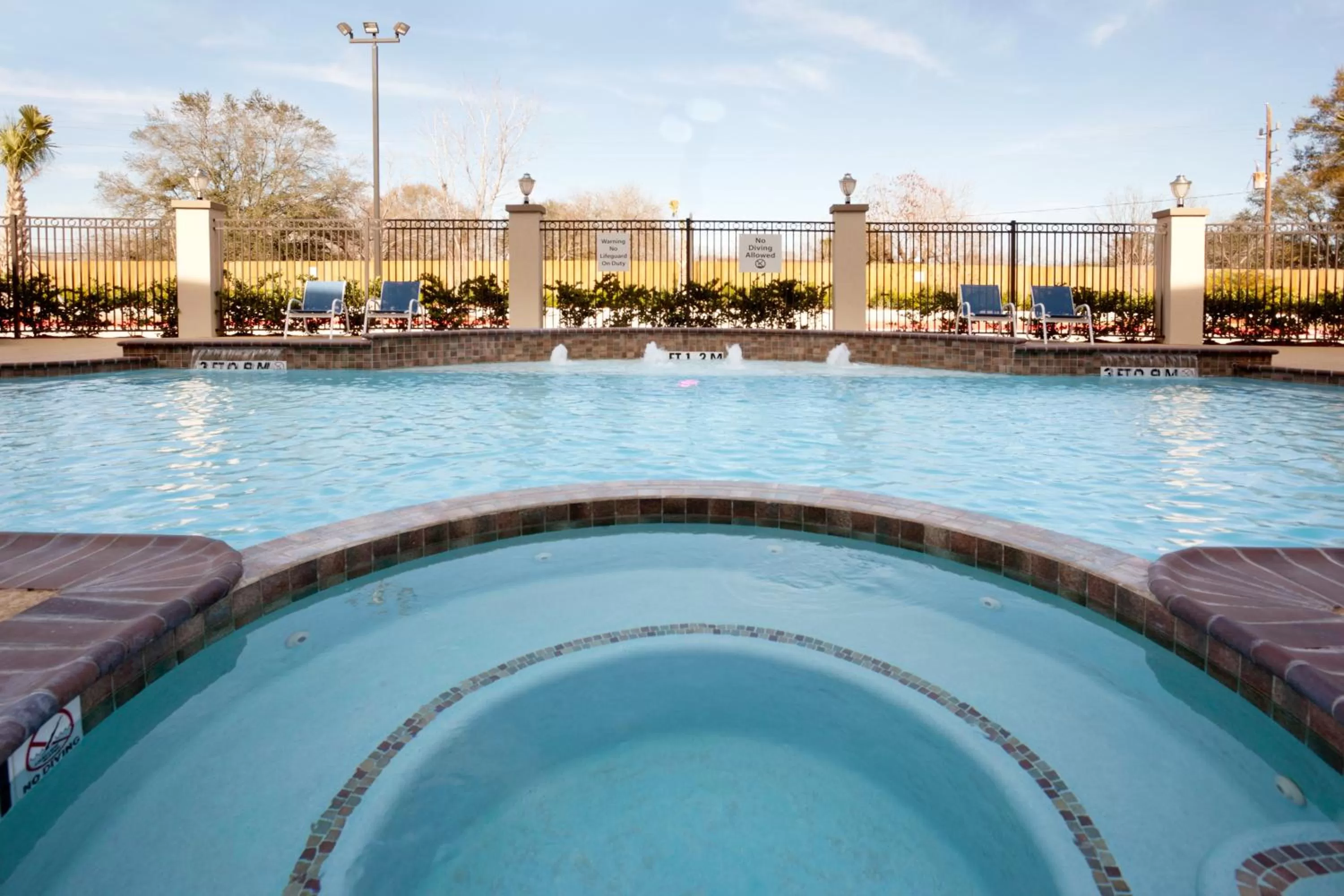 Swimming pool in Holiday Inn Express Hotel & Suites Houston NW Beltway 8-West Road by IHG