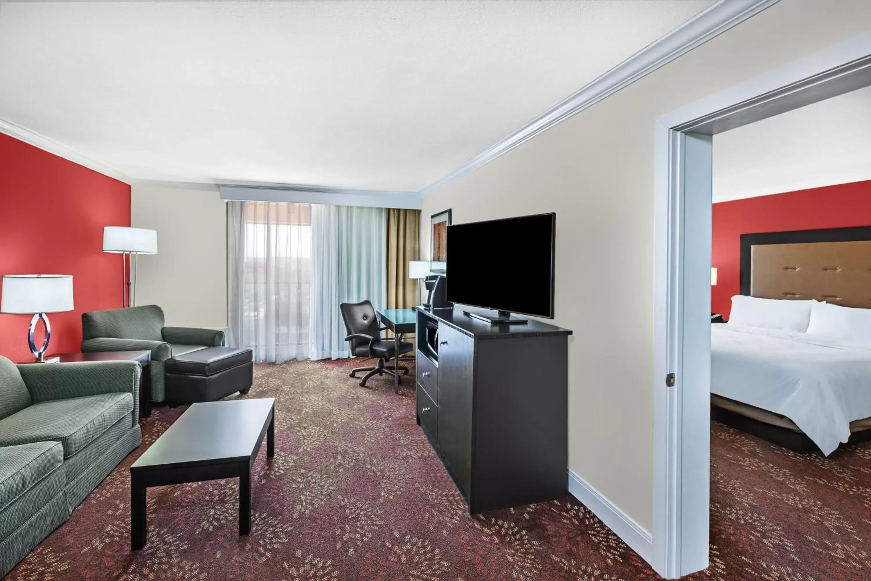 Photo of the whole room, TV/Entertainment Center in Holiday Inn Tyler - Conference Center, an IHG Hotel