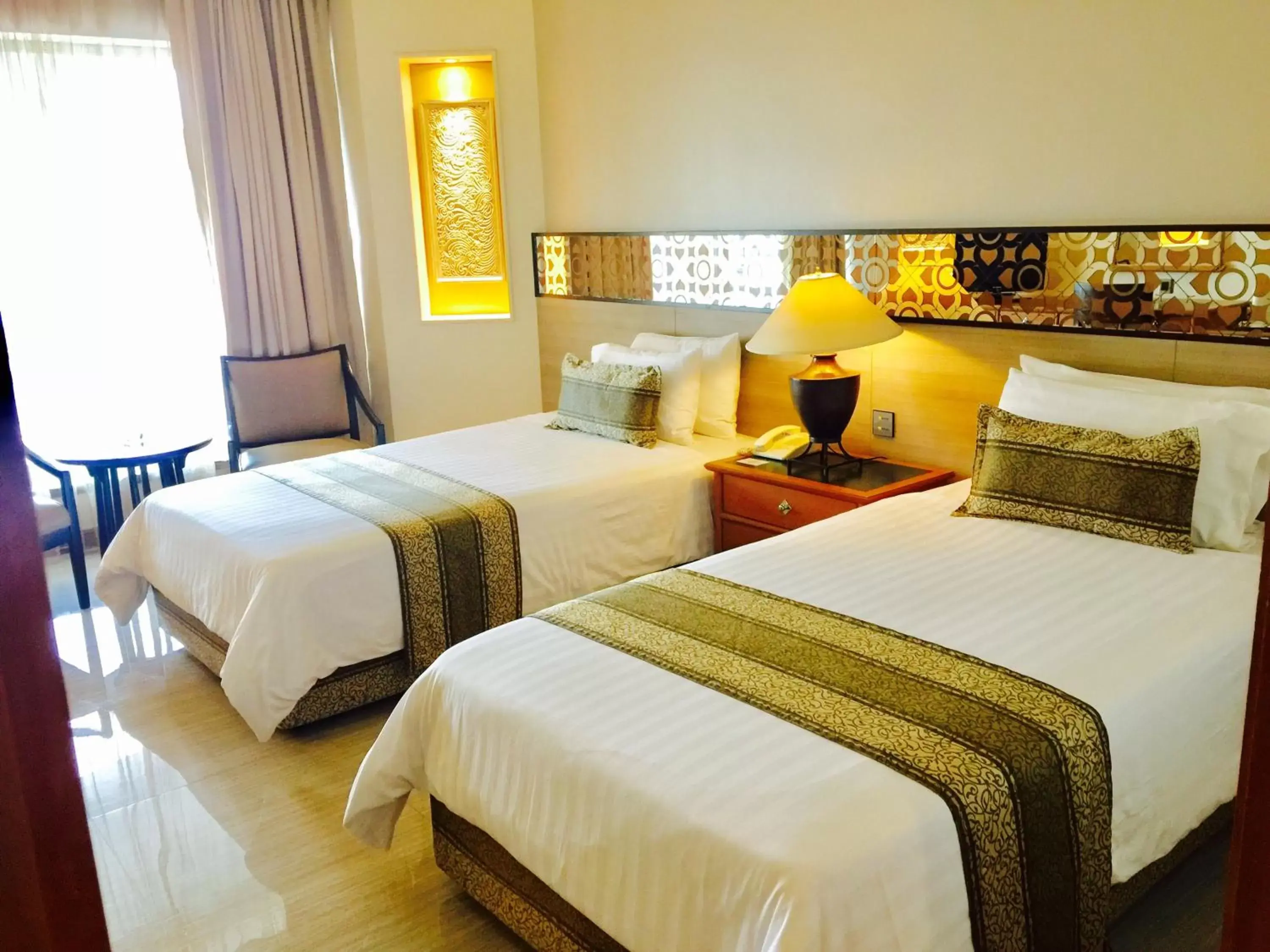 Photo of the whole room, Bed in Indra Regent Hotel