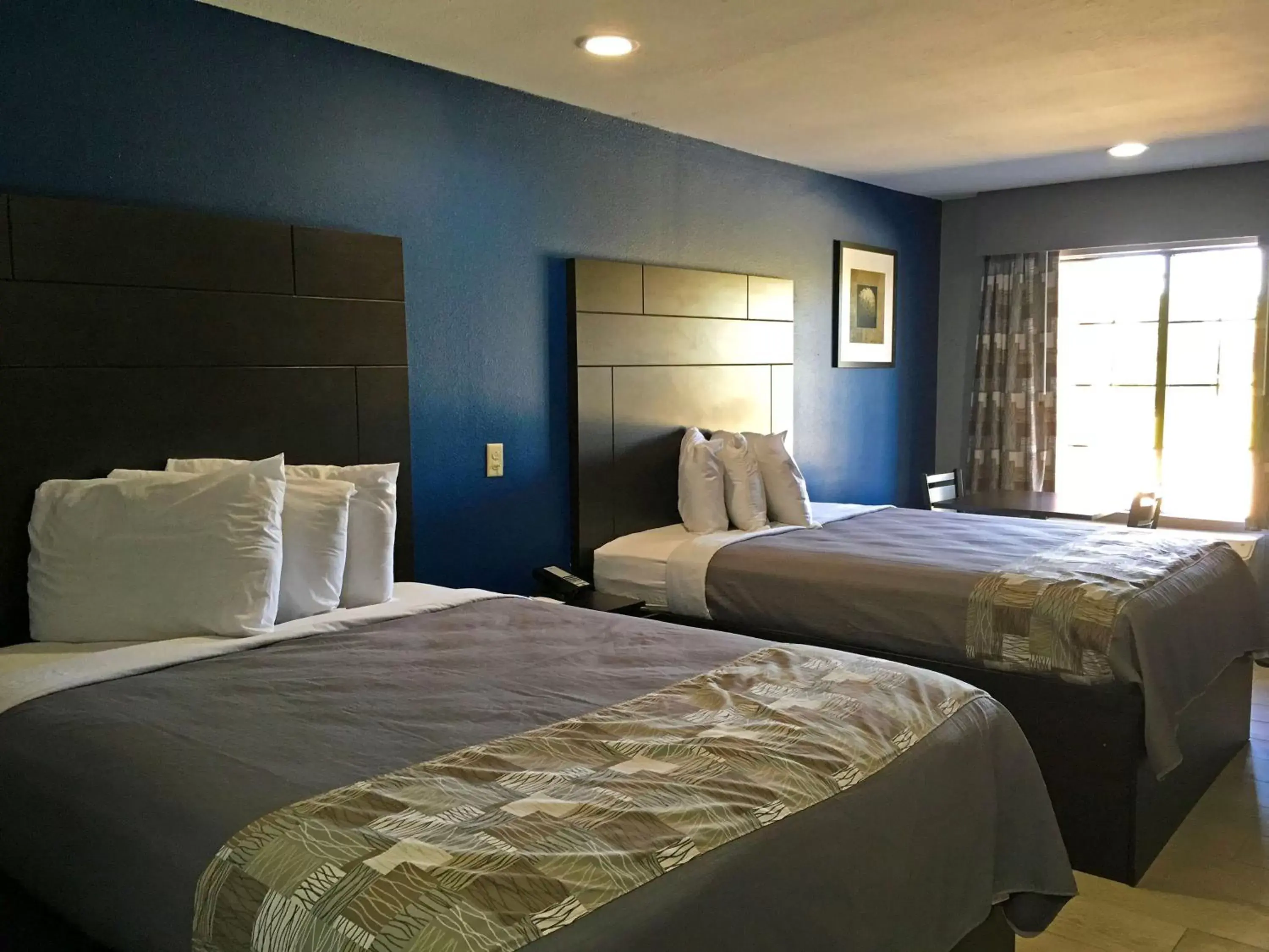 Bedroom, Bed in Americas Best Value Inn Denham Springs