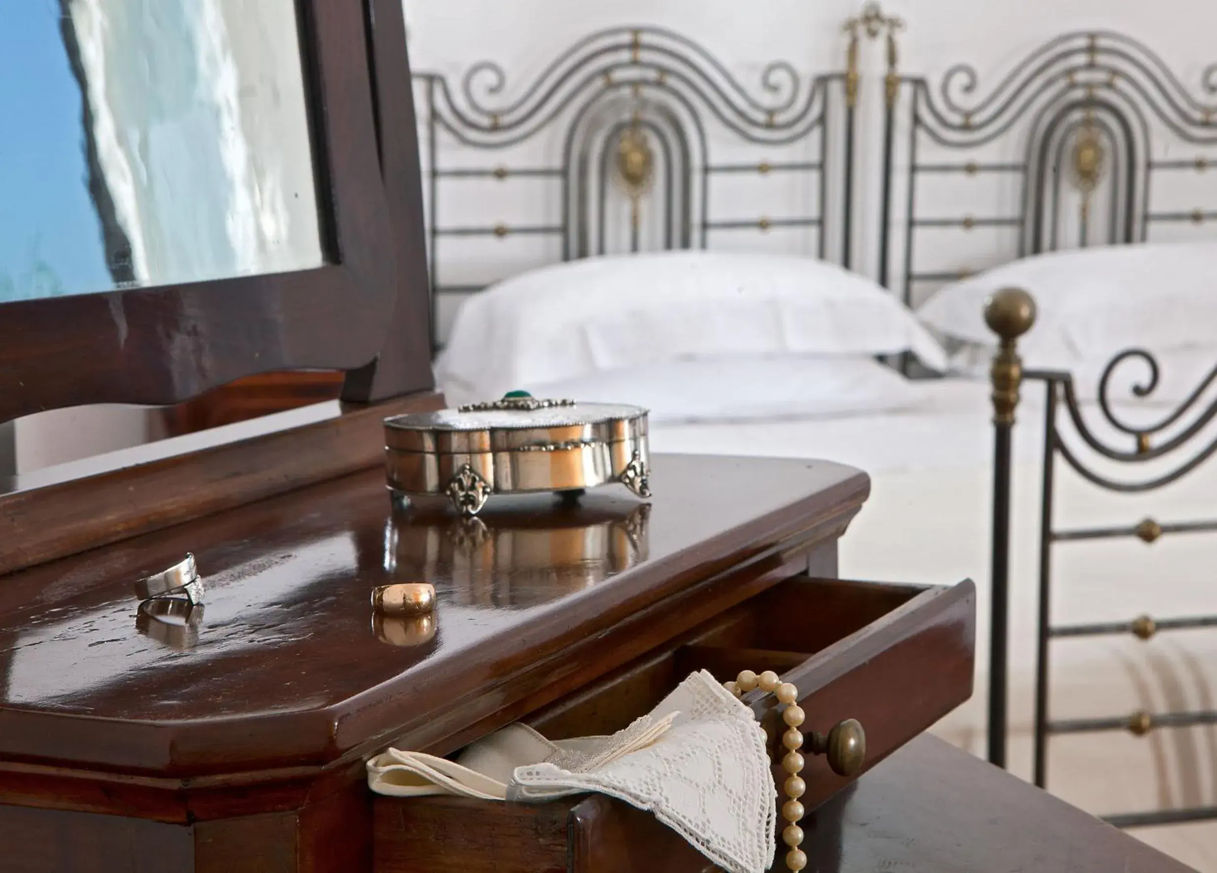 Decorative detail, Bed in Villa Oriana Relais Decorative detail, Bed in Villa Oriana Relais