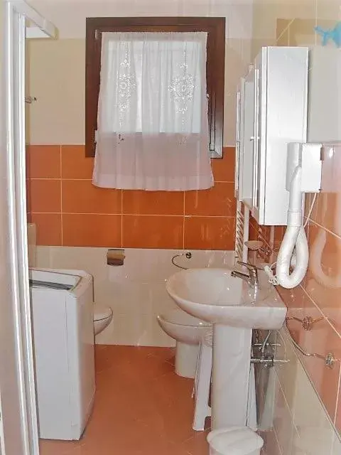 Bathroom in Villaggio dei Fiori Apart- Hotel 3 Stars - Family Resort