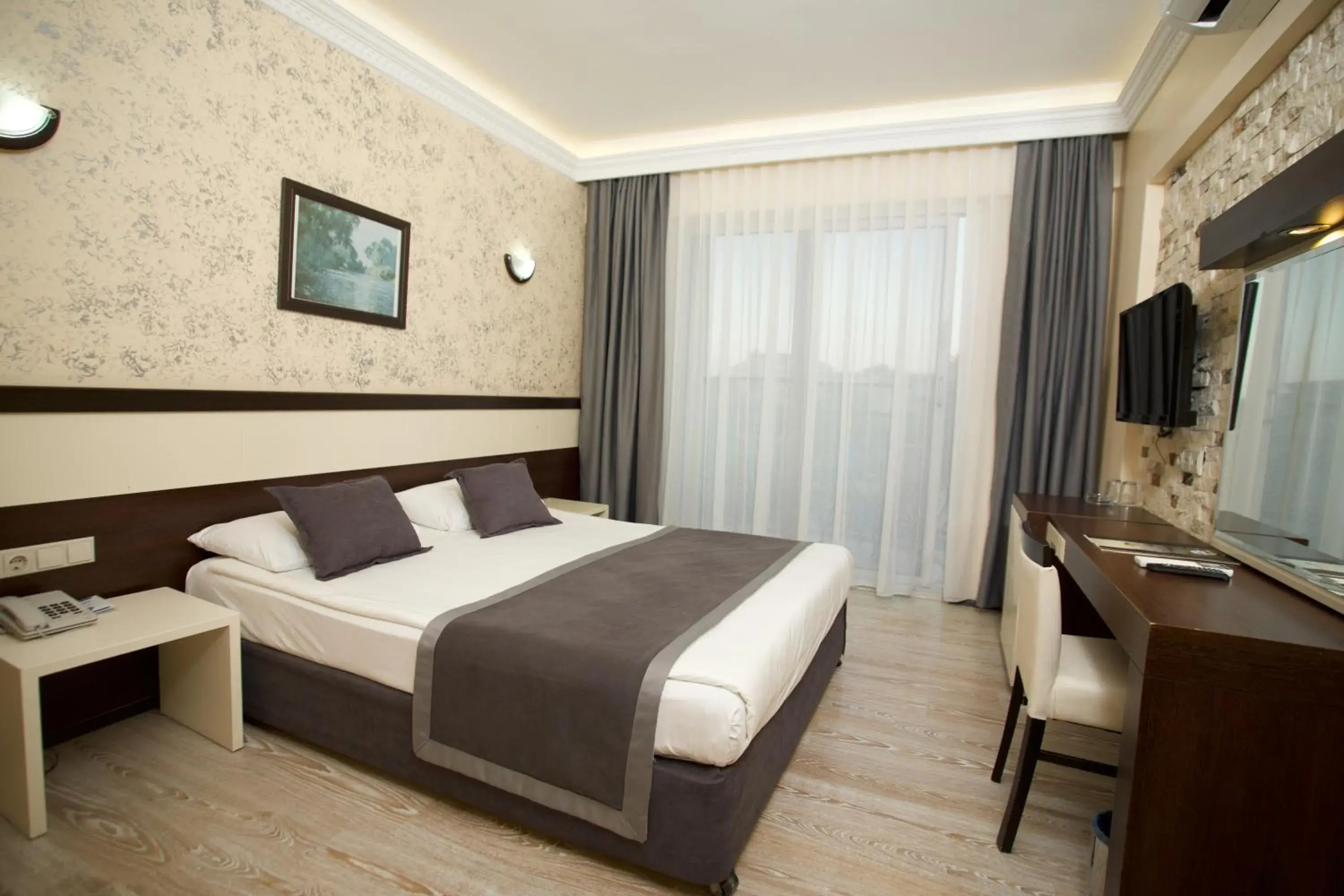 Property building, Bed in Camyuva Beach Hotel