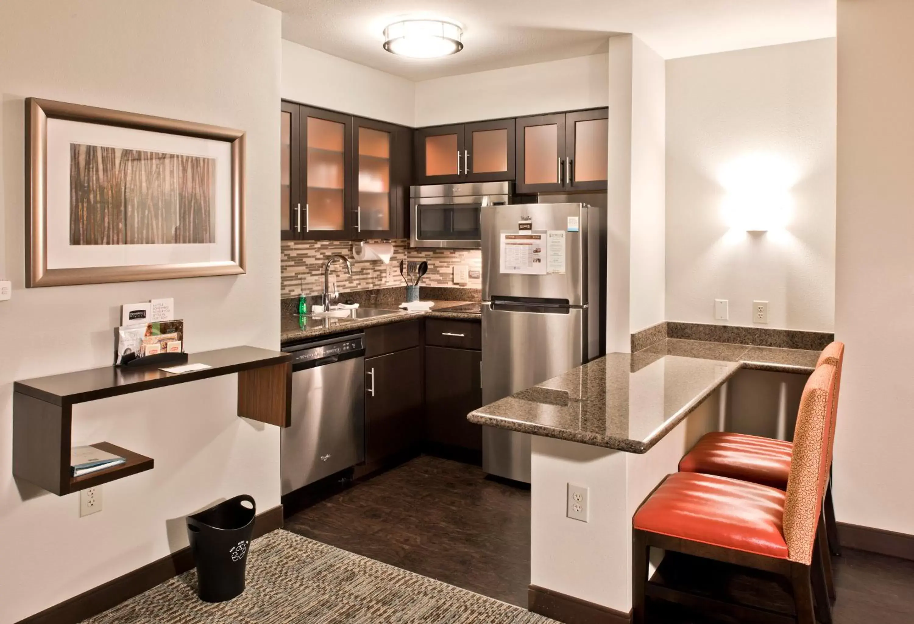 Bedroom, Kitchen/Kitchenette in Staybridge Suites - Charlotte Ballantyne, an IHG Hotel