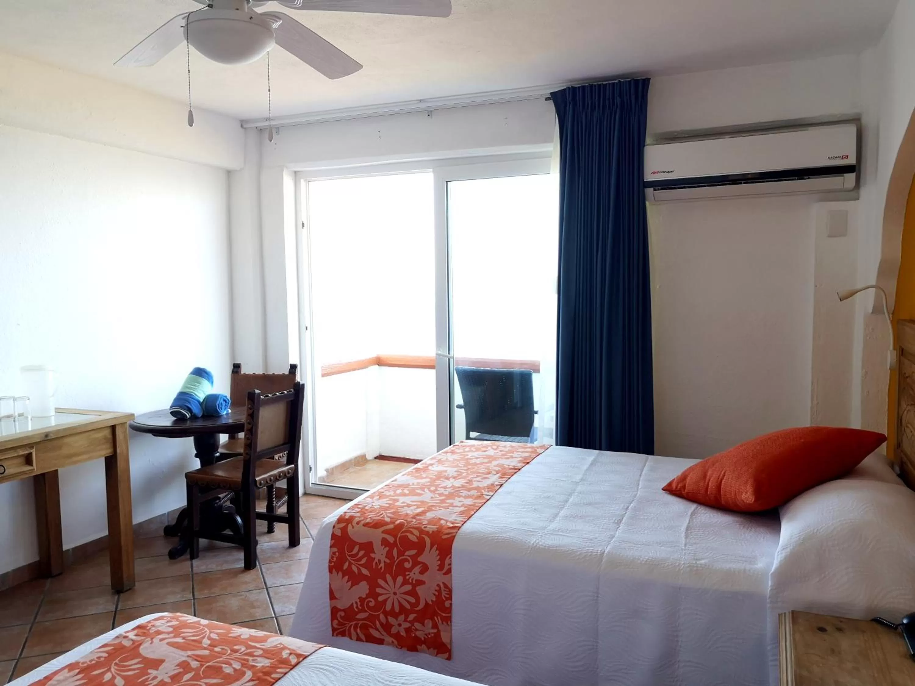 Seating area, Bed in Hotel El Pescador