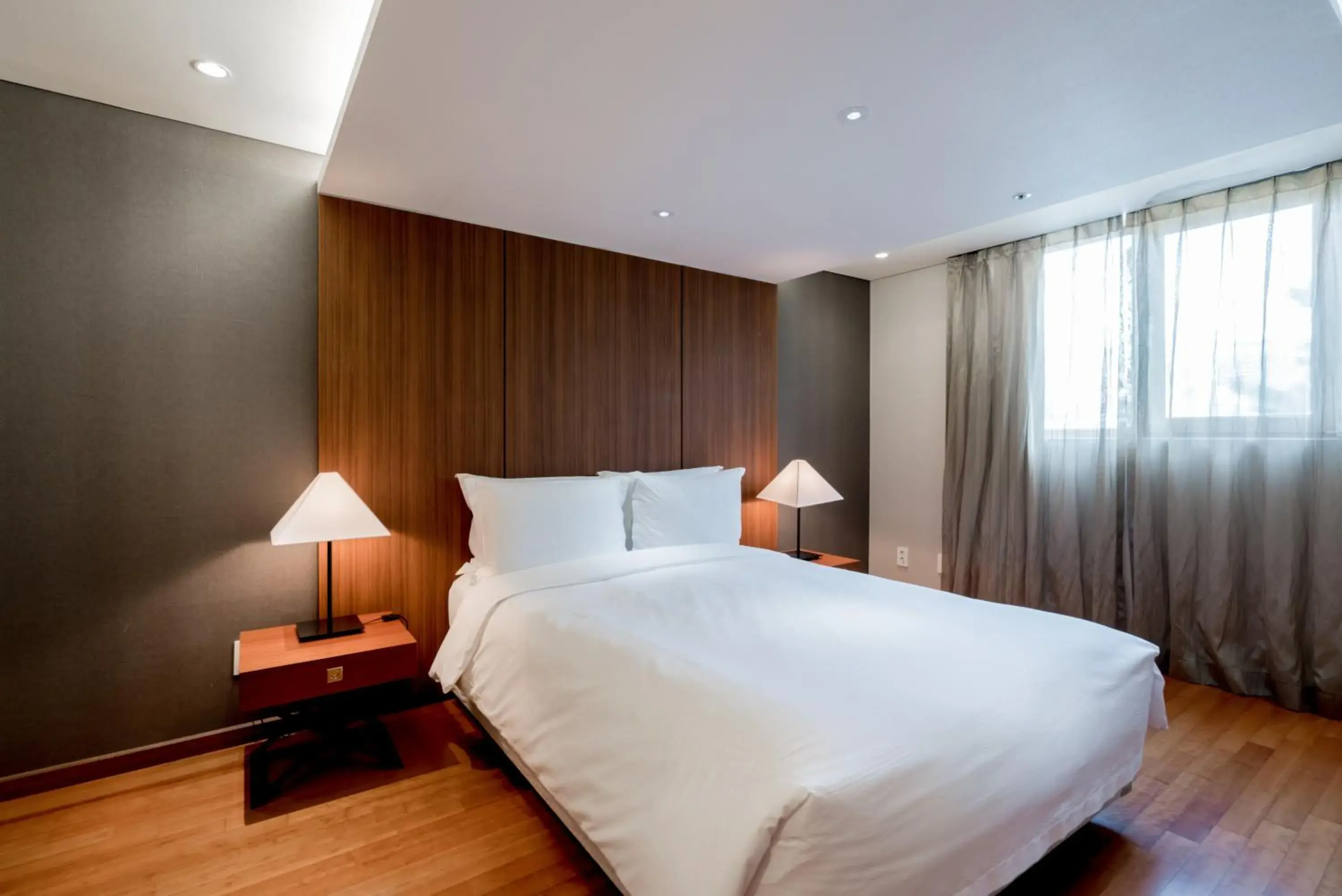 Bed in Oriens Hotel & Residences Myeongdong