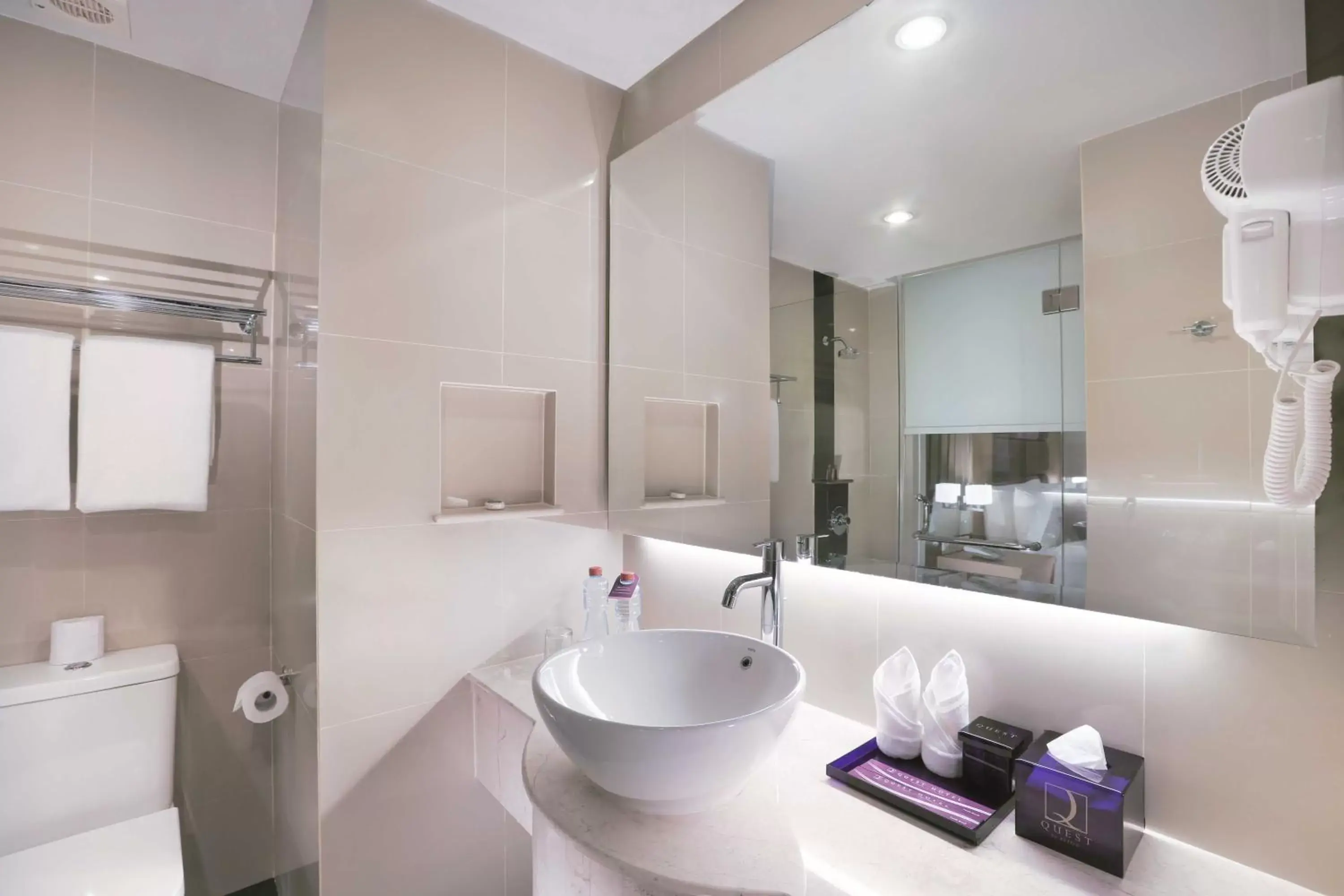 Bathroom in Quest Hotel Darmo - Surabaya by ASTON