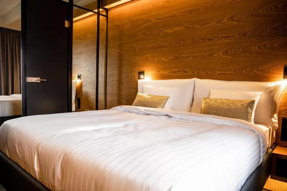 Photo of the whole room, Bed in GINN Hotel Hamburg Elbspeicher