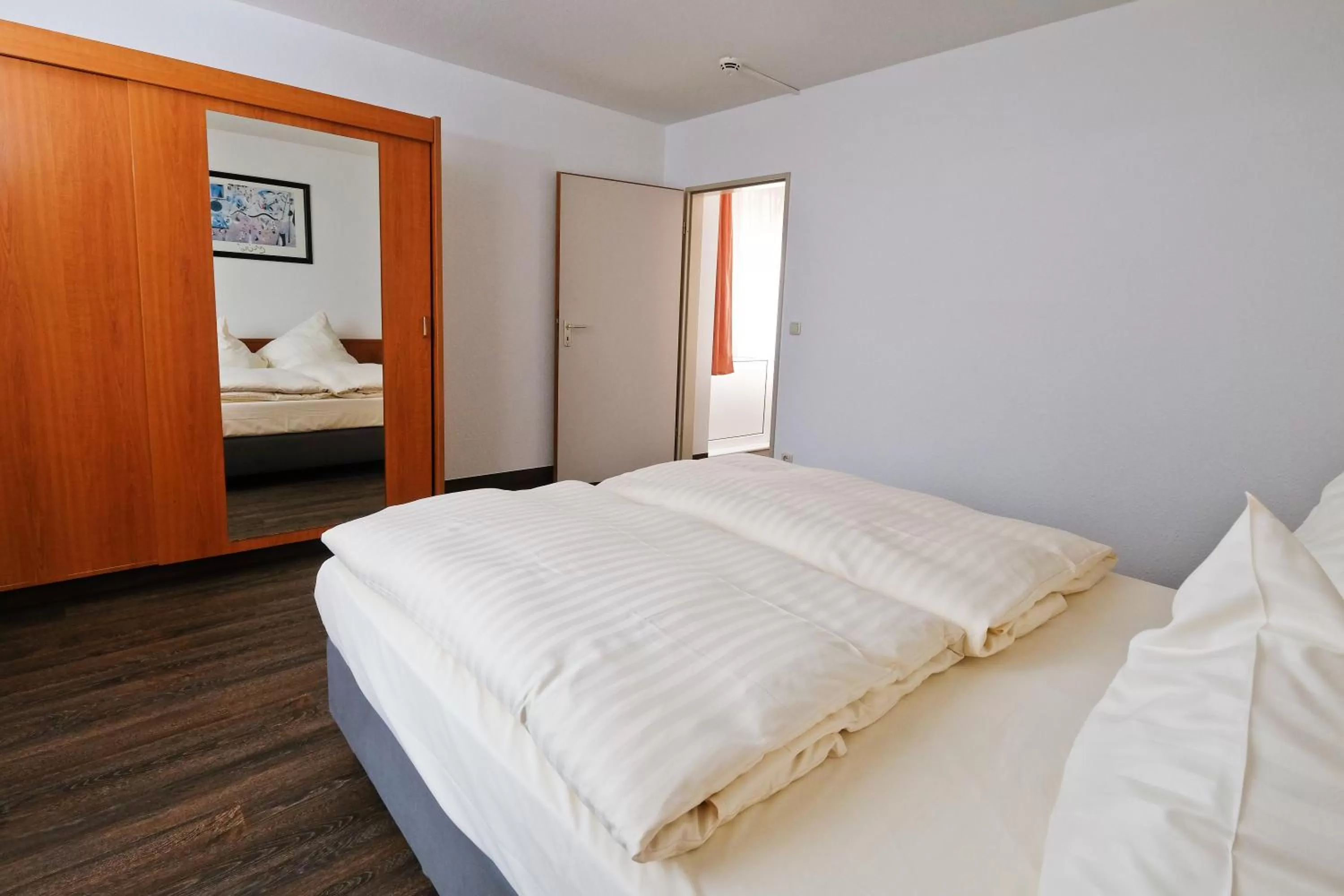 Bed in Apart Hotel Sehnde