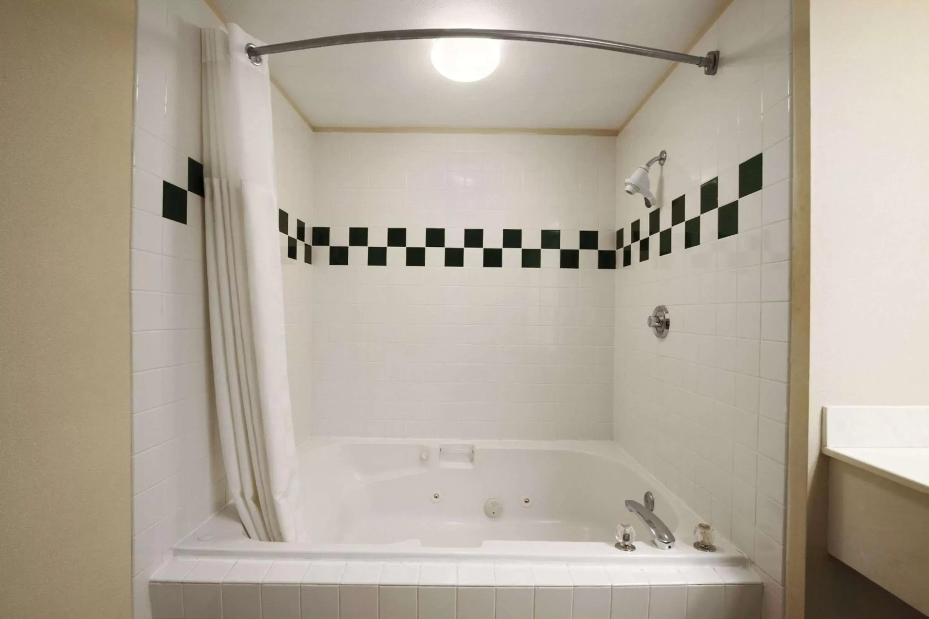 Photo of the whole room, Bathroom in Ramada by Wyndham SeaTac Airport