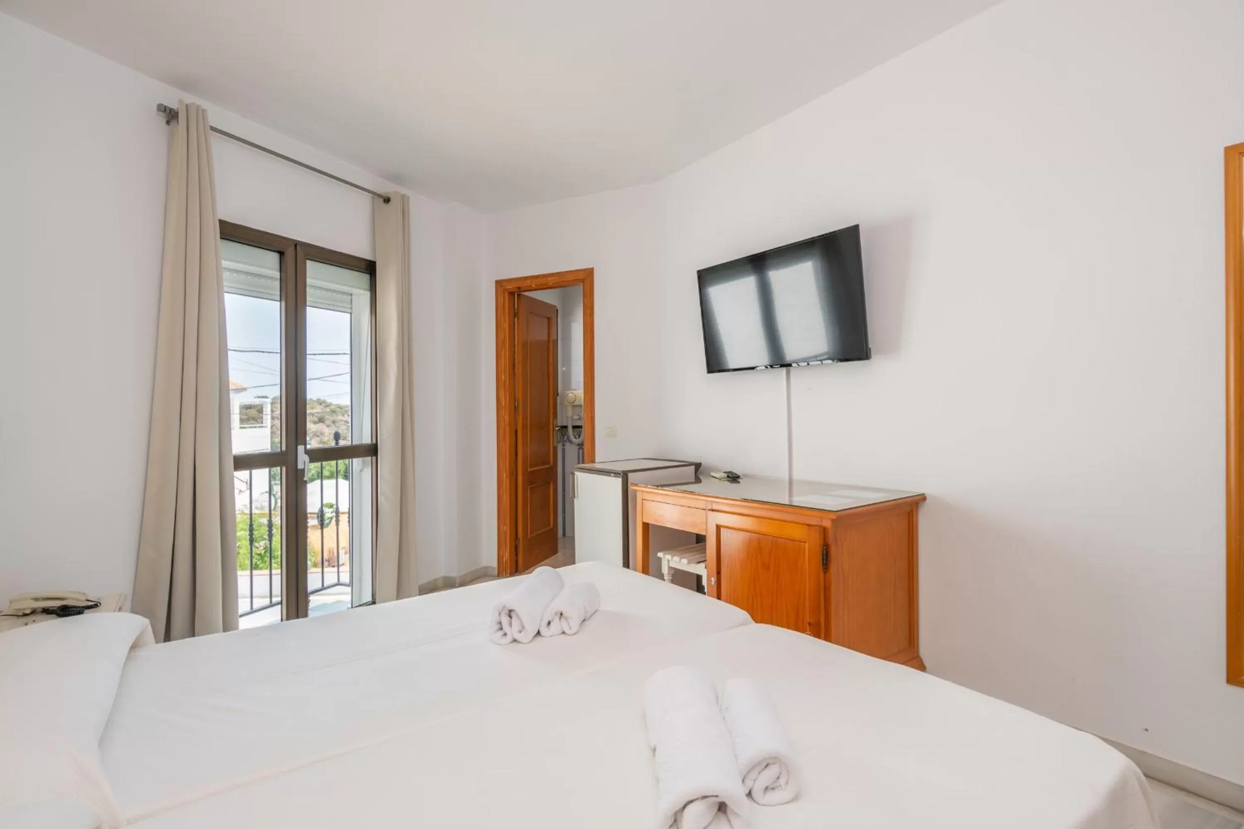 Photo of the whole room, Bed in Apartahotel Playamaro by Dorobe