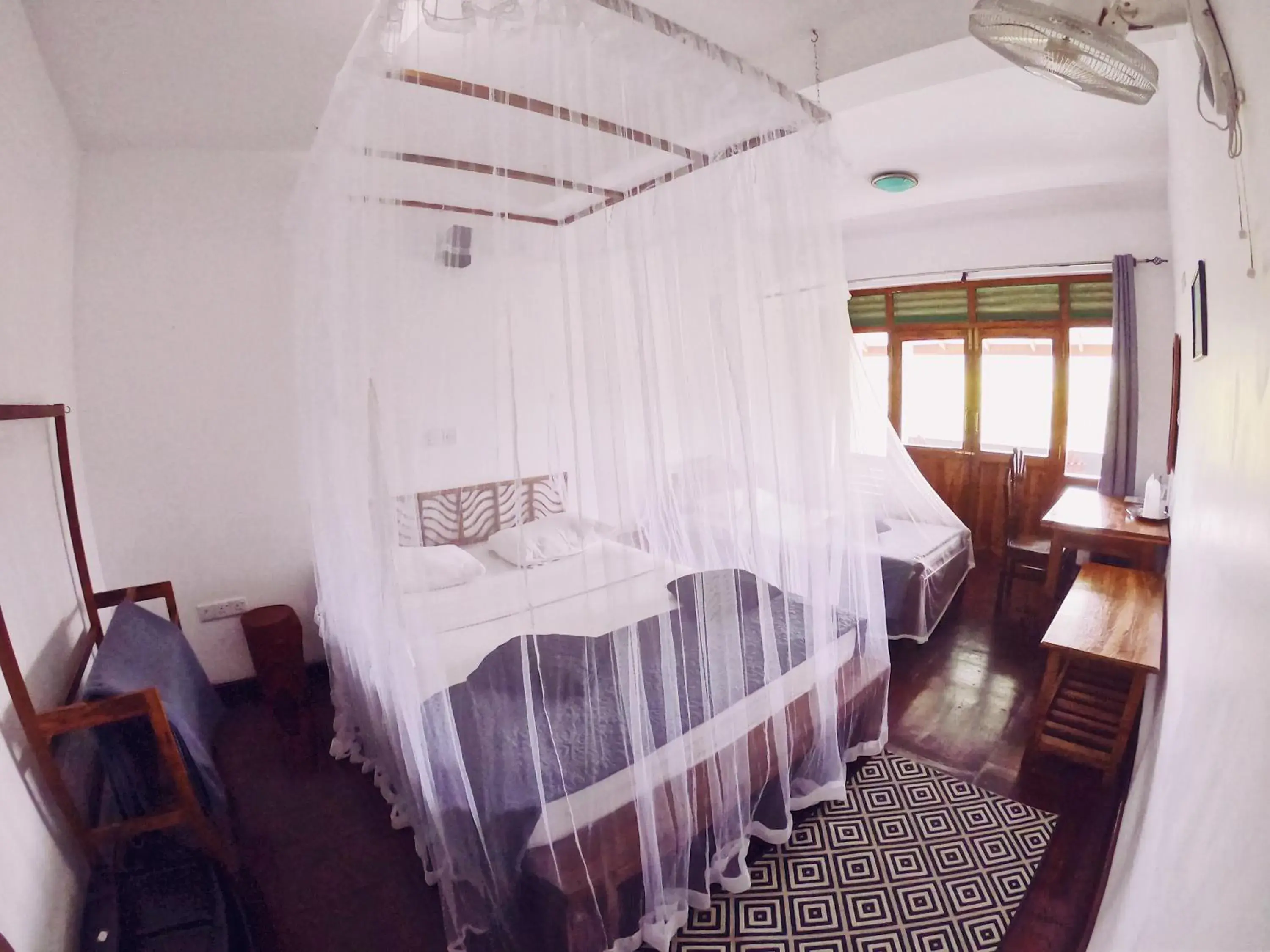 Bed in Lakshmis Hotel