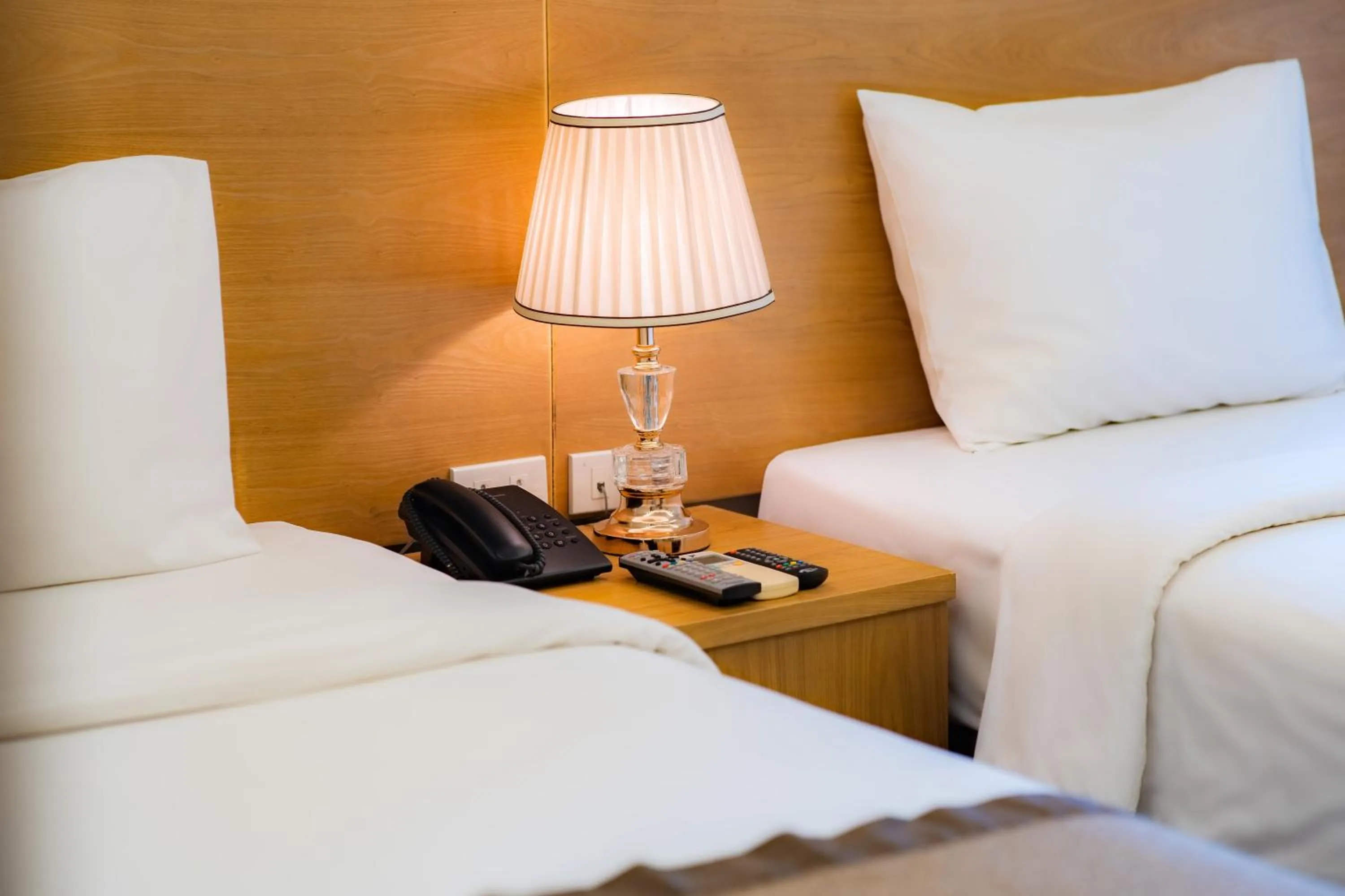 Bed in Riverside Hanoi Hotel