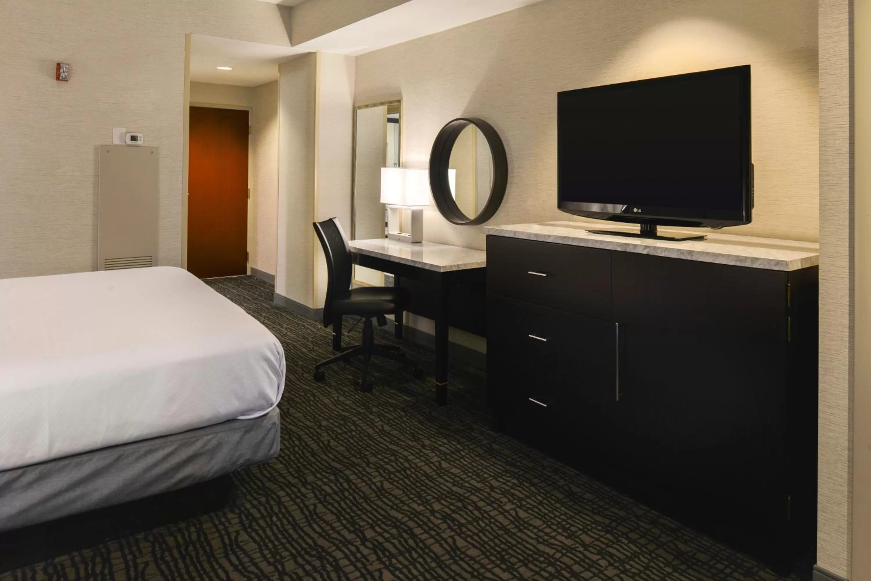 Photo of the whole room, Bed in Crowne Plaza Springfield Convention Center by IHG
