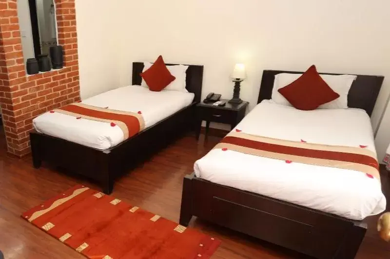 Bed in Thamel Eco Resort