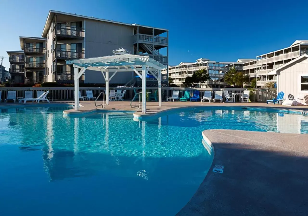 Swimming pool, Property Building in Atlantic Beach Resort, a Ramada by Wyndham