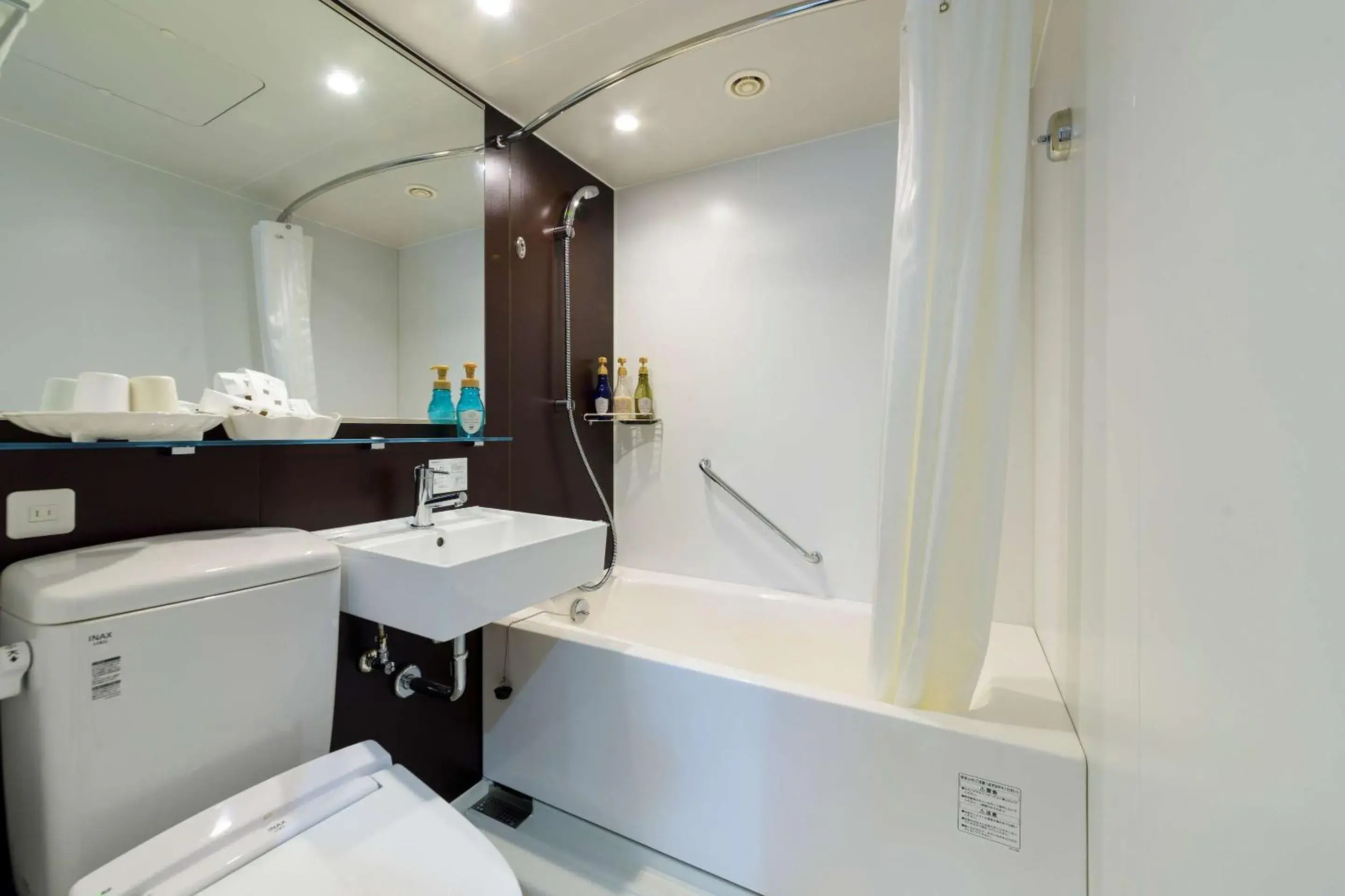 Bathroom in SureStay Plus Hotel by Best Western Shin-Osaka