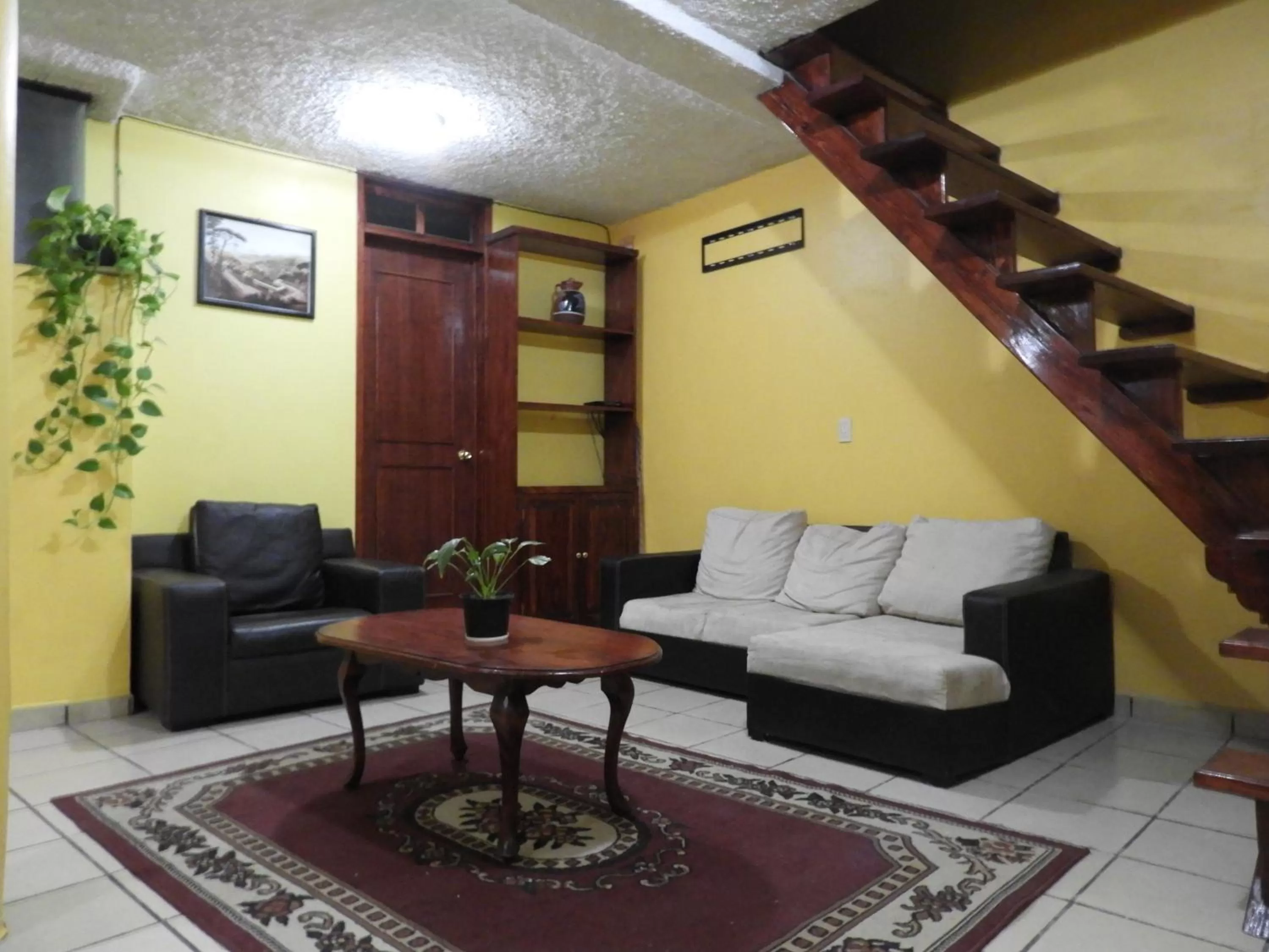 Communal lounge/ TV room in La Lotería Panoramic House & Rooftop by Lunian