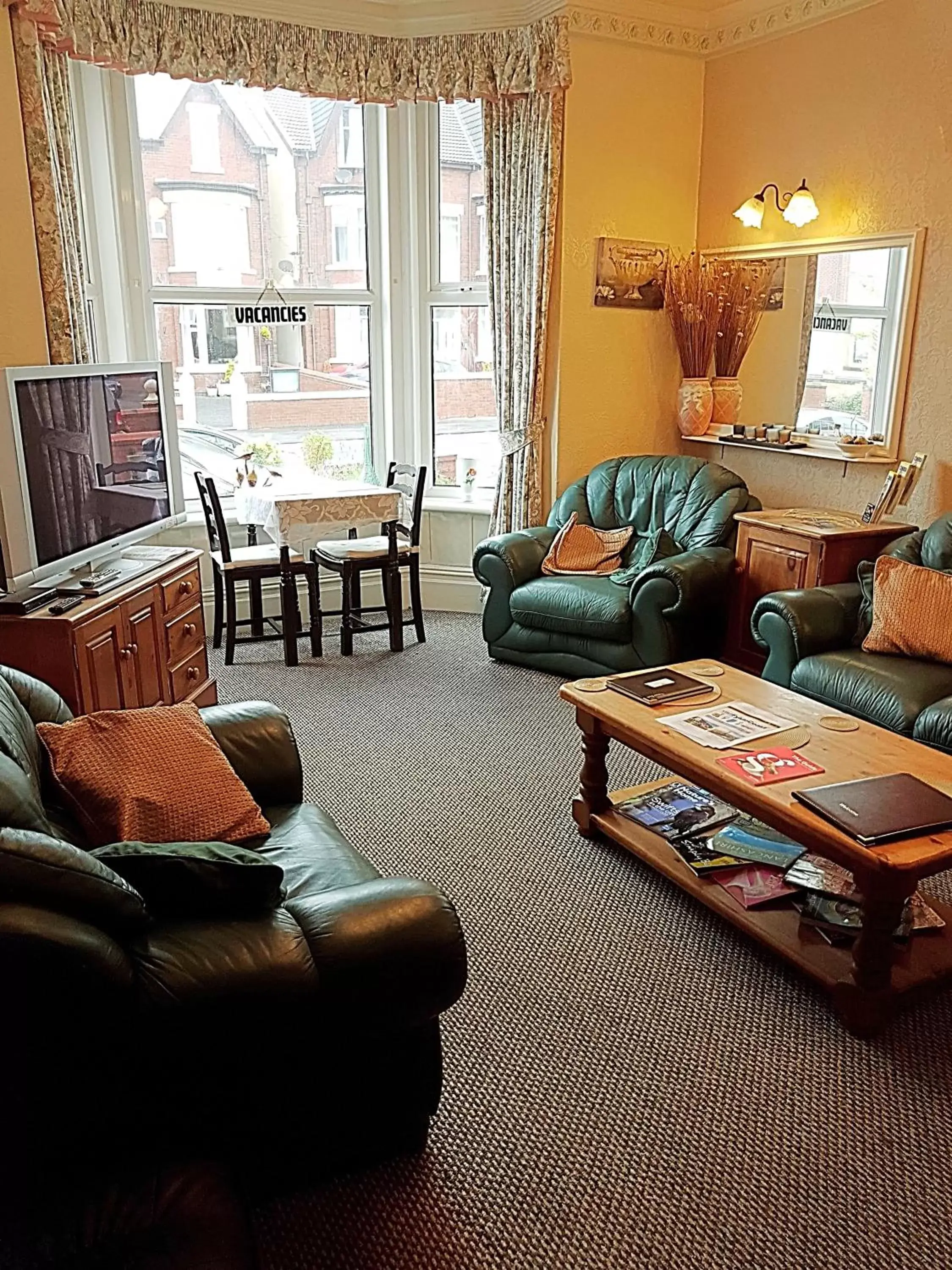 Communal lounge/ TV room, Seating Area in Cumbria Guest House