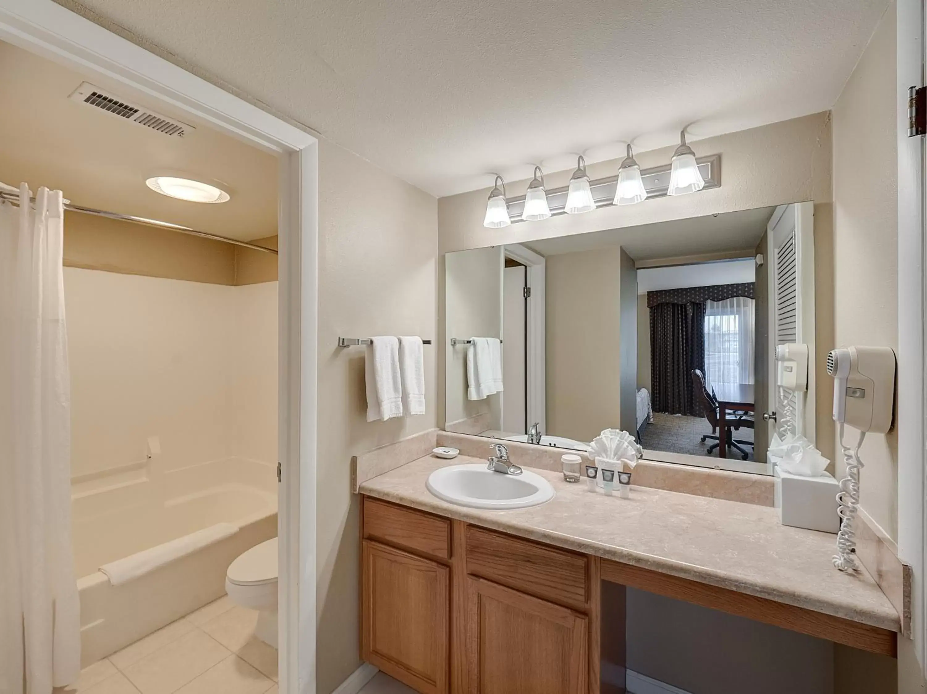 Bathroom in Eastland Suites Extended Stay Hotel & Conference Center Urbana