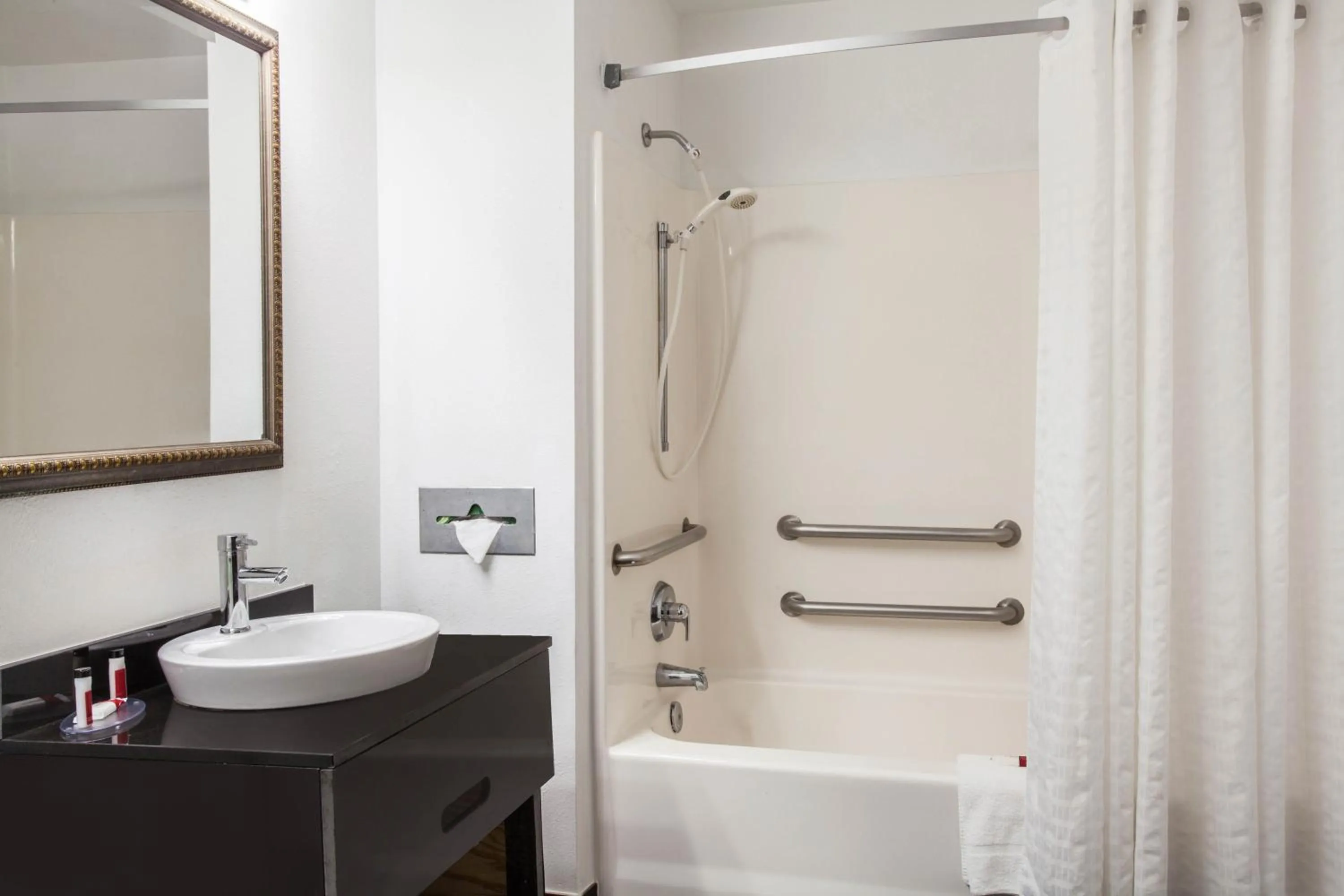 Bathroom in Super 8 by Wyndham Pensacola