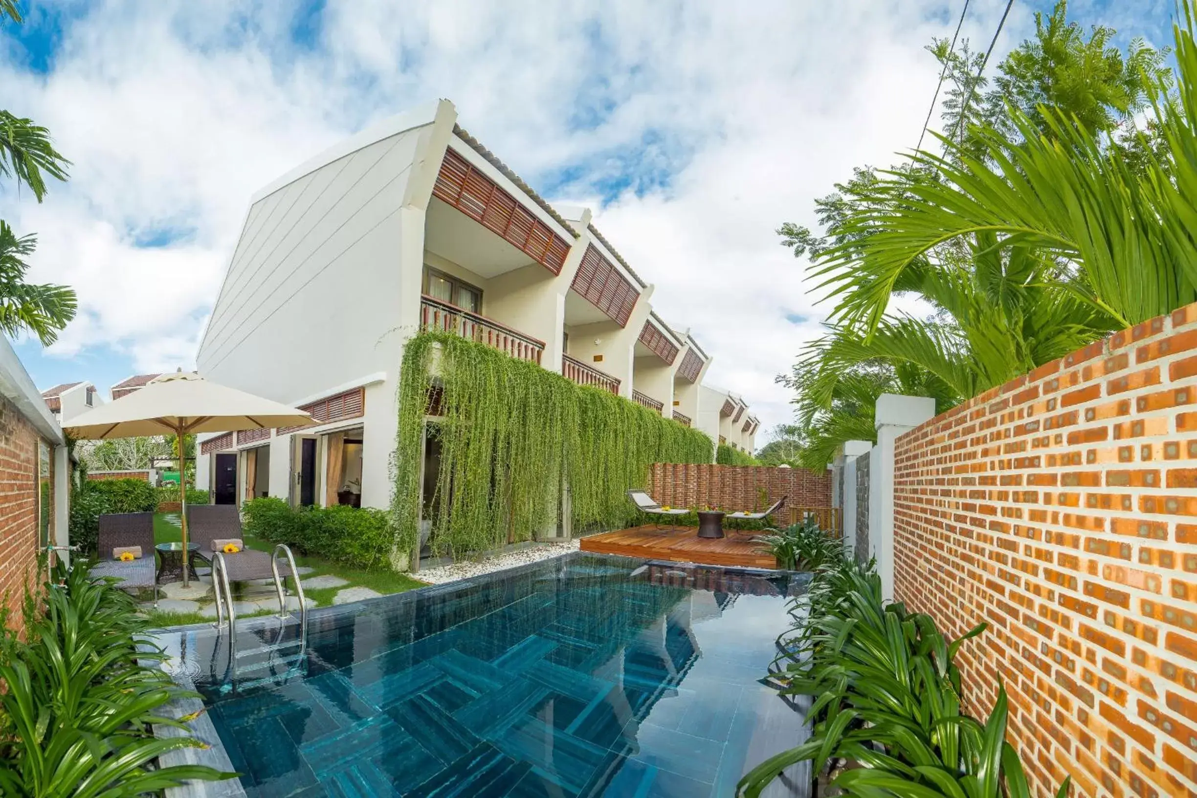 Swimming pool, Property Building in Silk Sense Hoi An River Resort