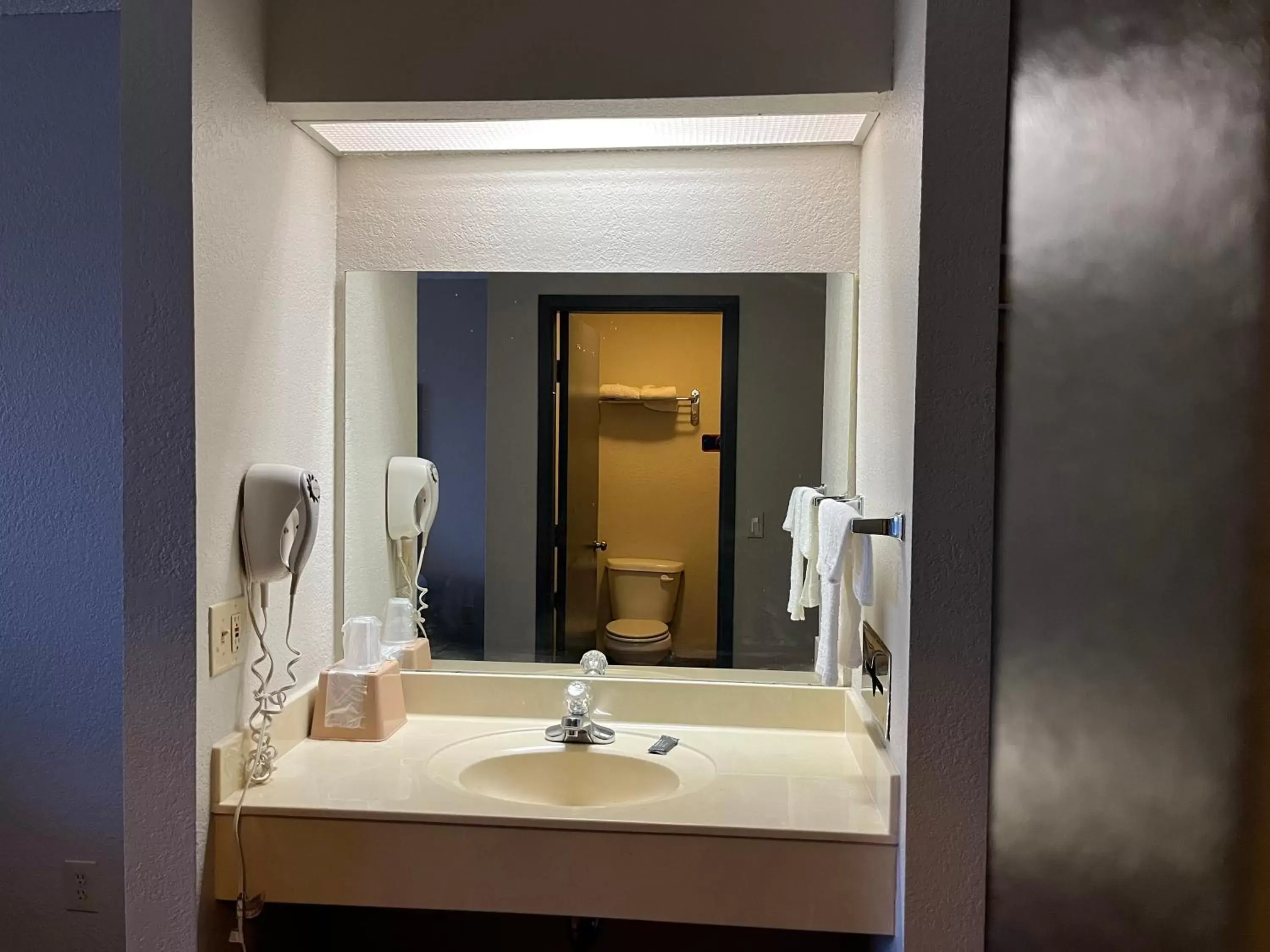 Bathroom in Hometown Inn Airport