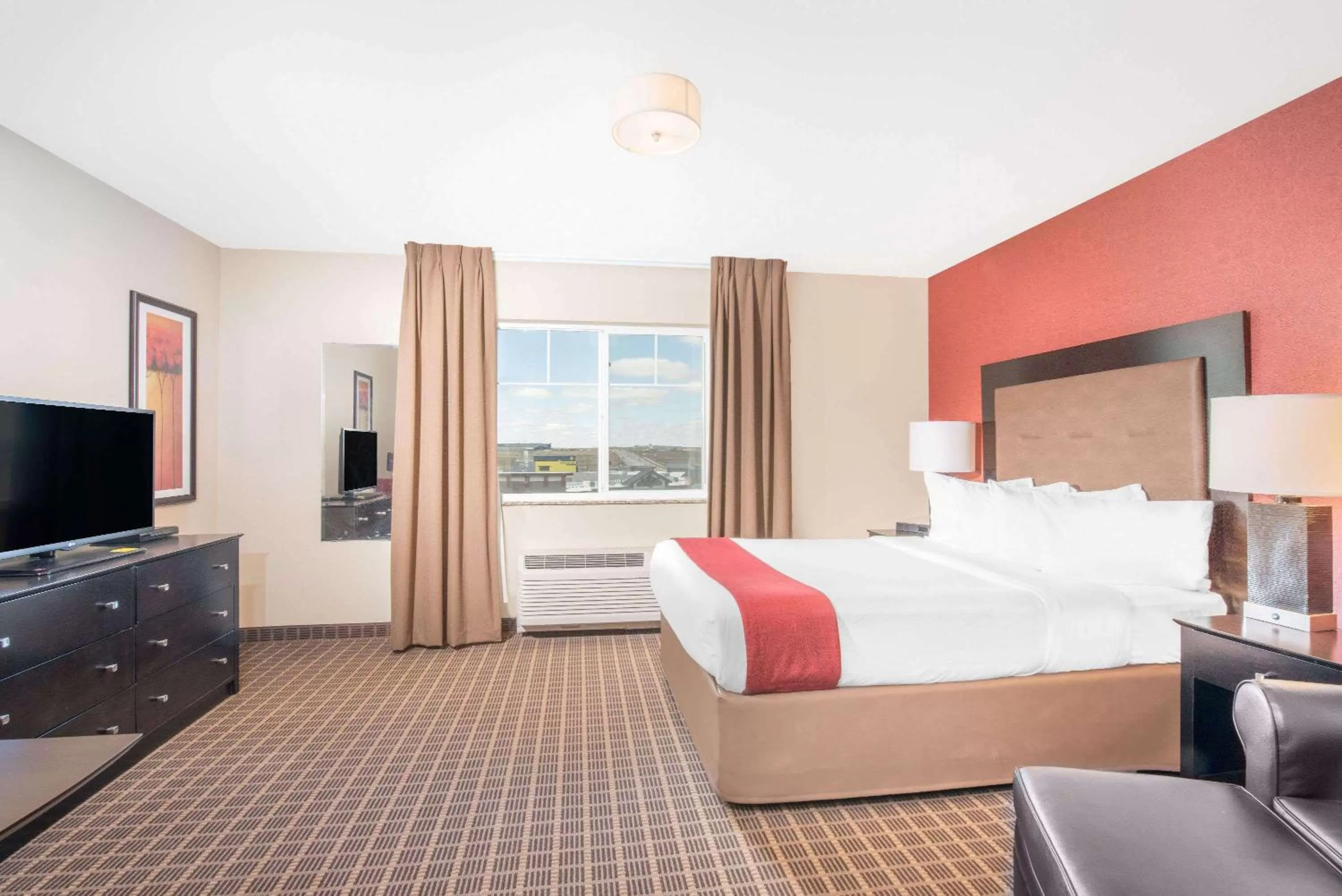 Photo of the whole room, Bed in Hawthorn Extended Stay by Wyndham Dickinson