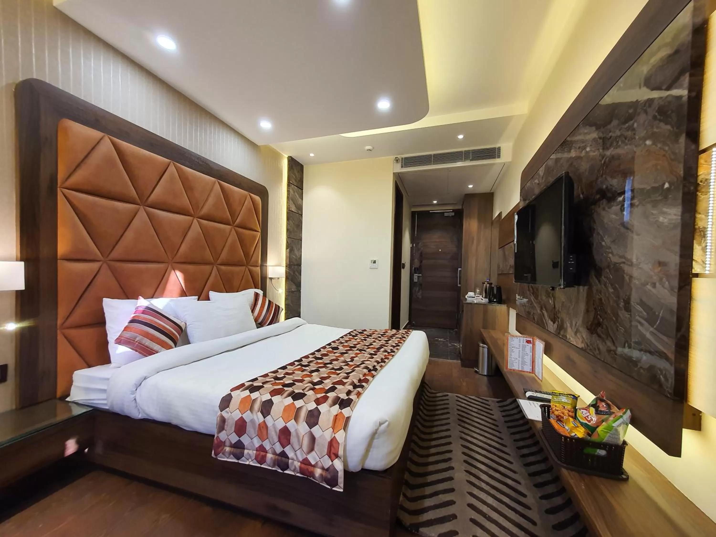 Bed in Hotel Makhan Residency