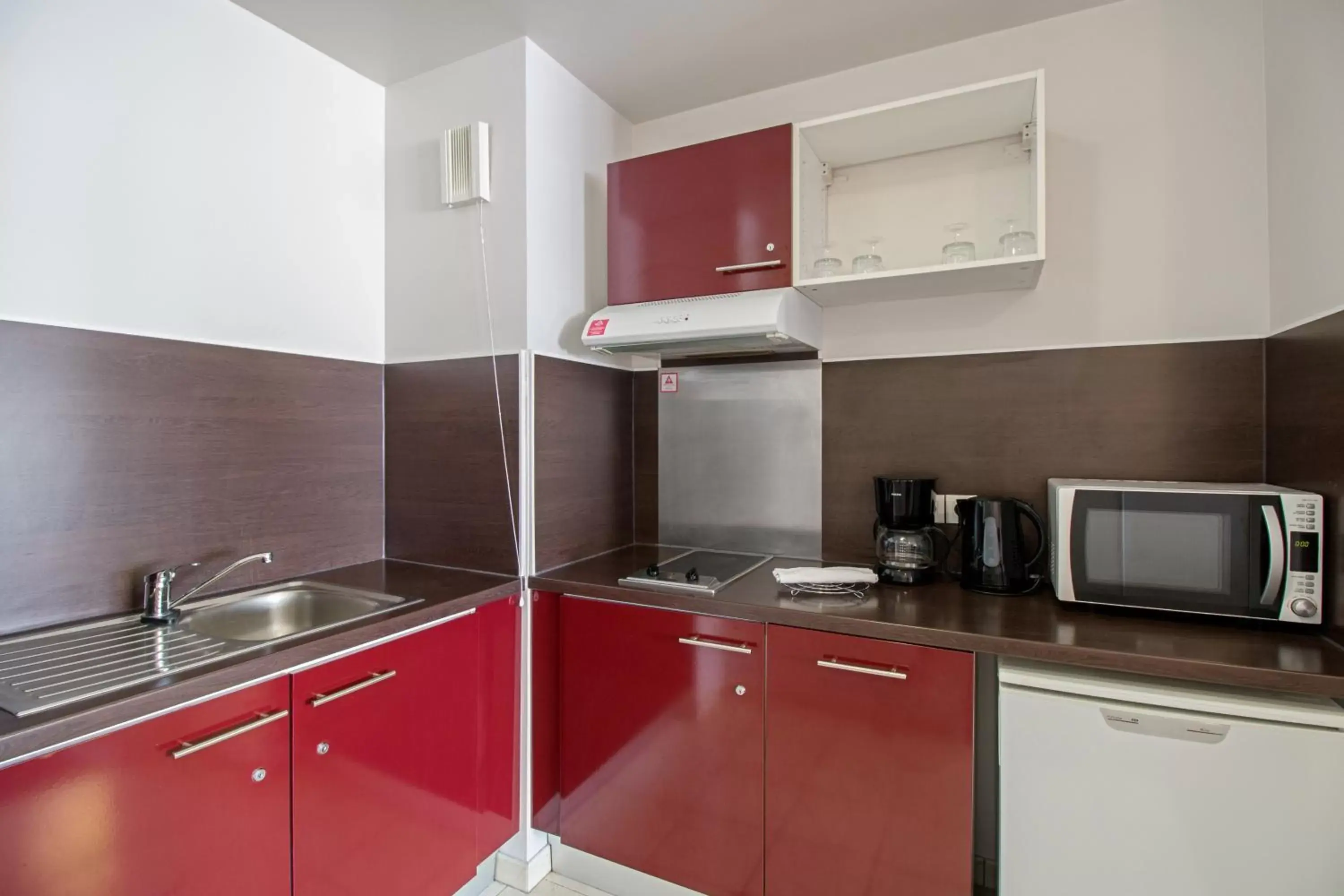 Kitchen or kitchenette, Kitchen/Kitchenette in Appart'City Confort Paris Villejuif (Ex Park&Suites)