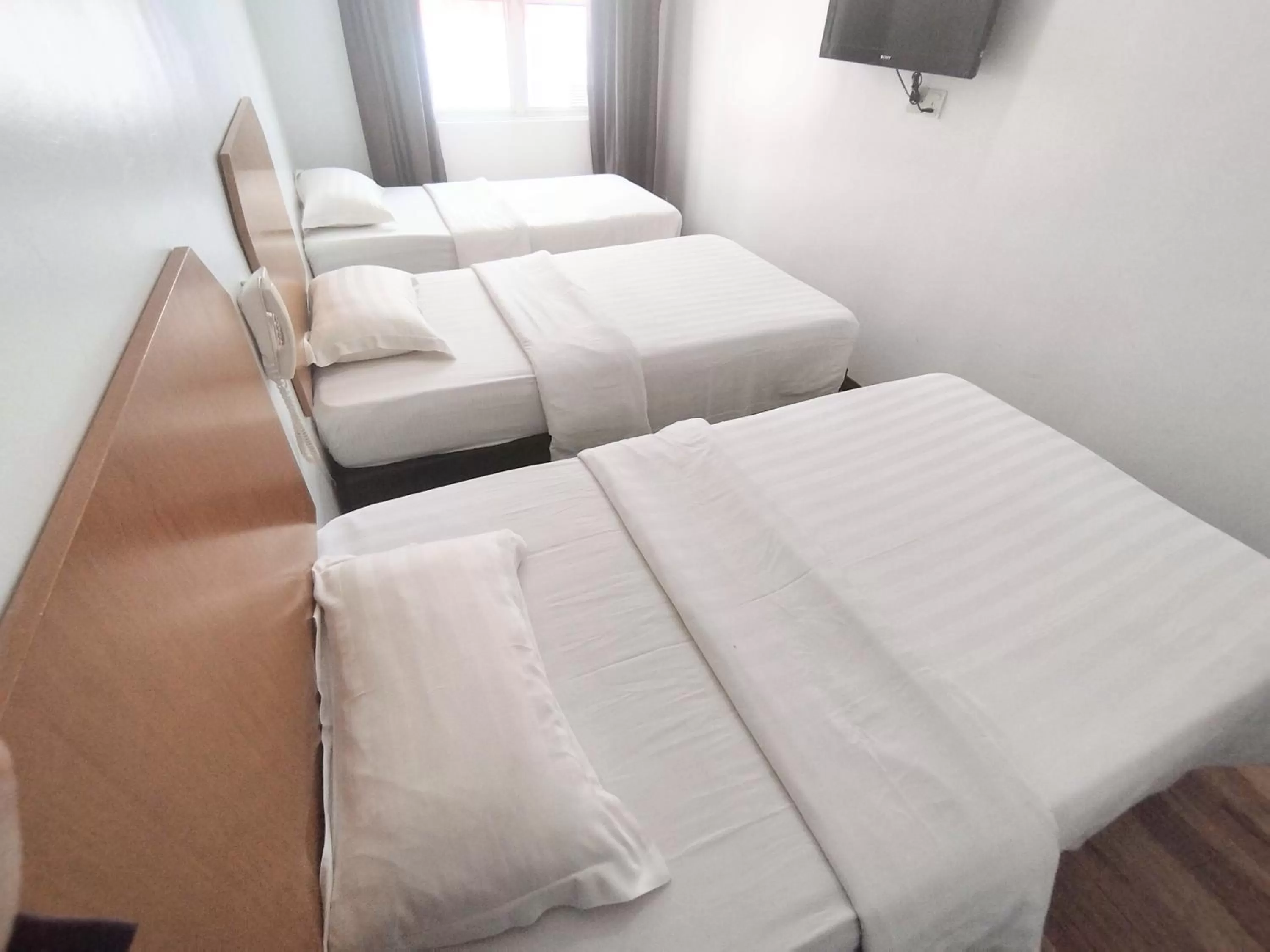 Bed in Marine Bay Hotel