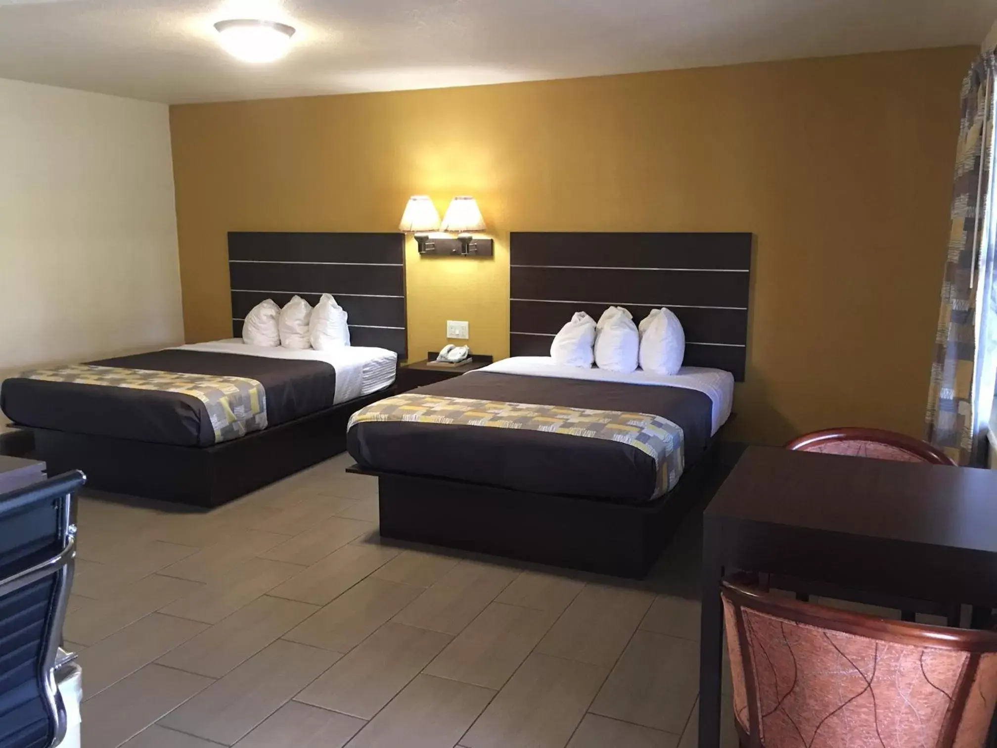 Bed in American Inn Punta Gorda