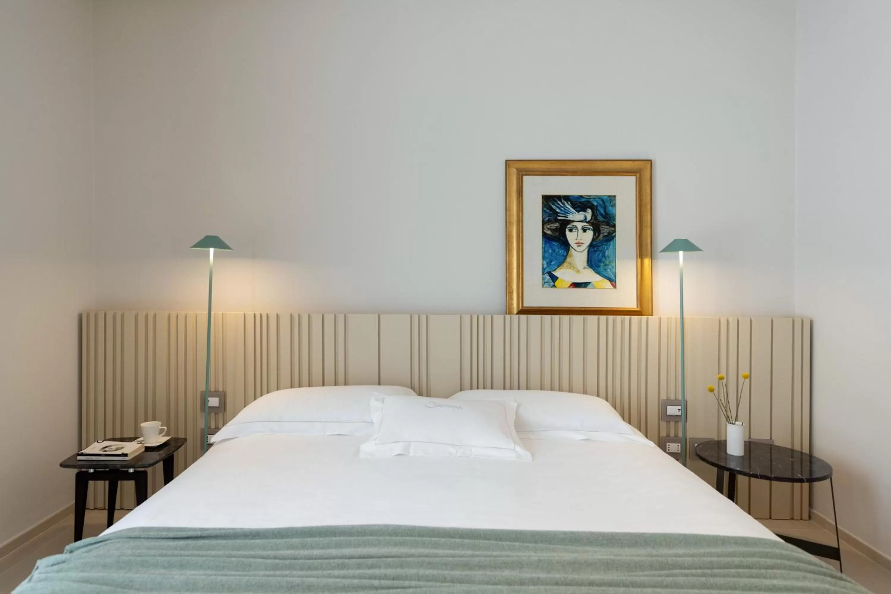 Bed in Taodomus Boutique Hotel