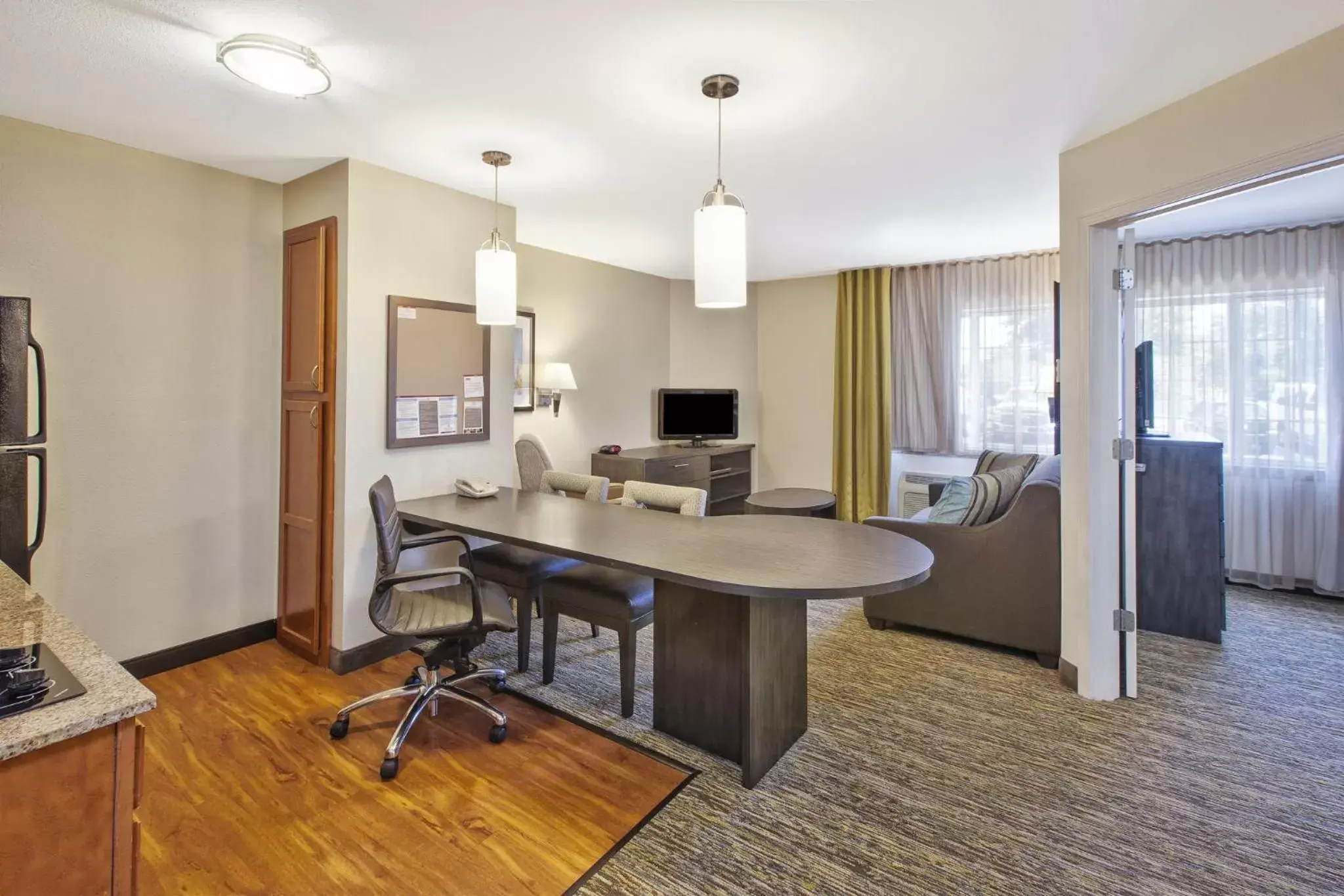 Photo of the whole room, Kitchen/Kitchenette in Candlewood Suites Indianapolis Airport, an IHG Hotel