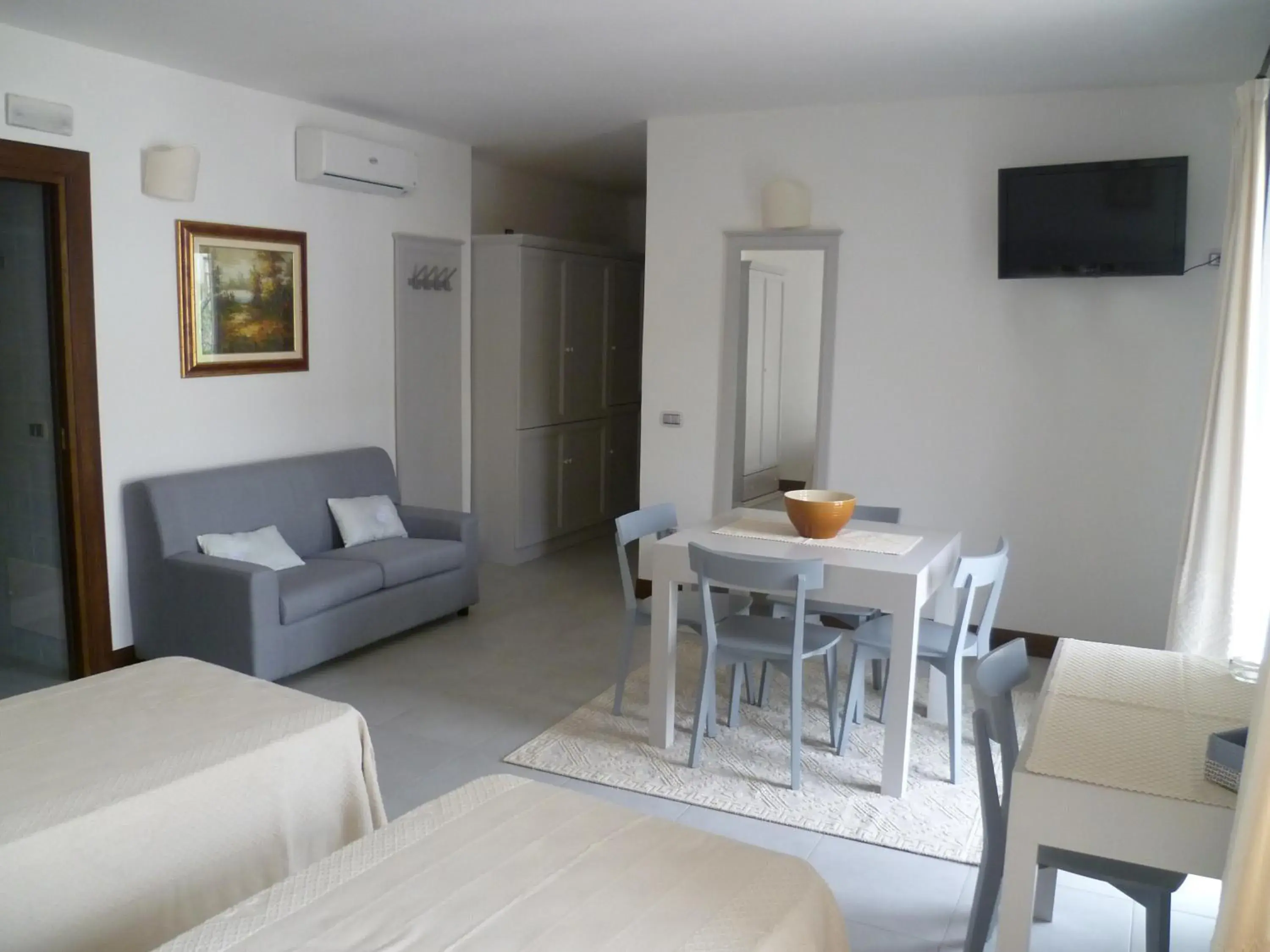 Bedroom, Seating Area in Albergo Residenziale La Corte