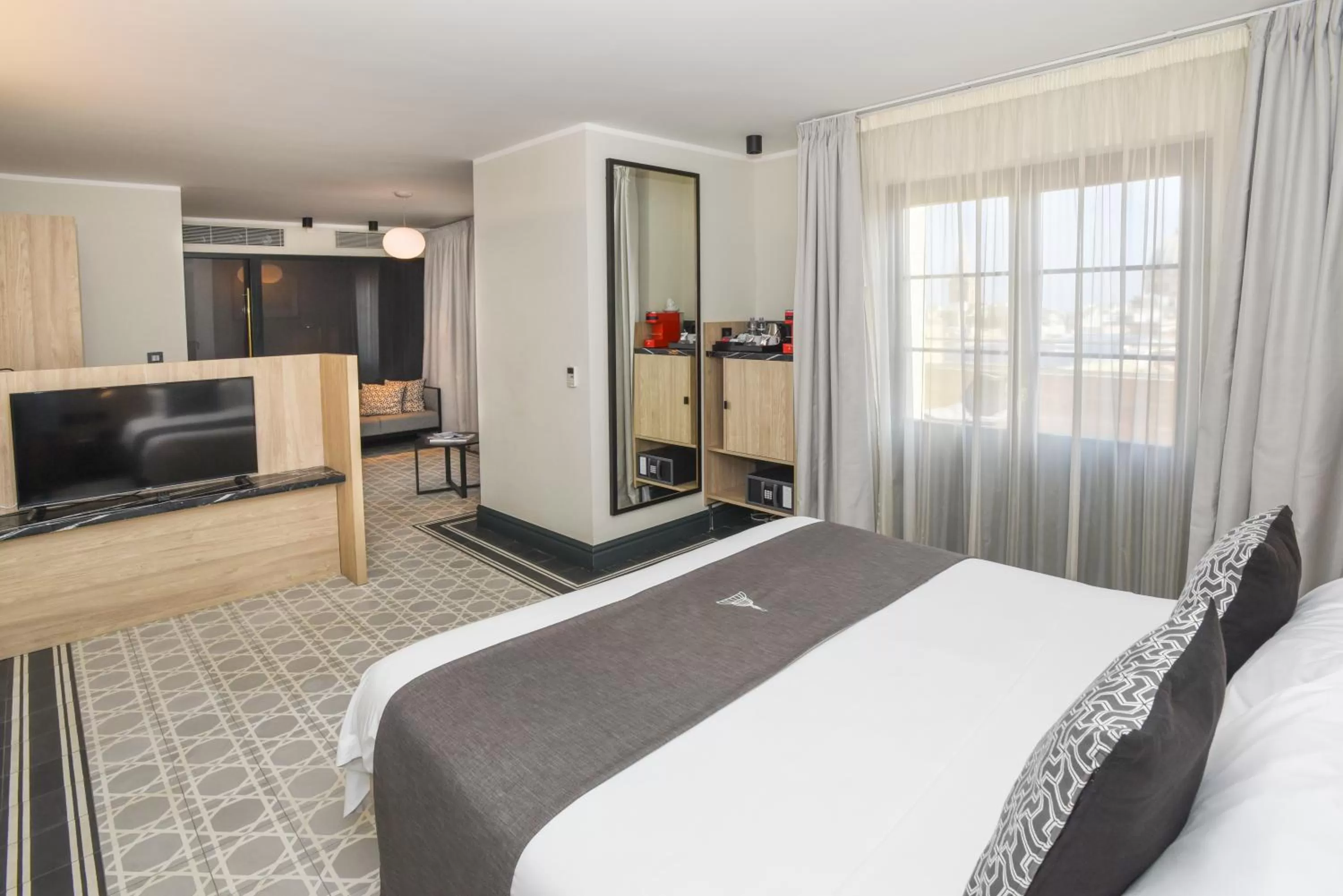 Bed in La Falconeria Hotel