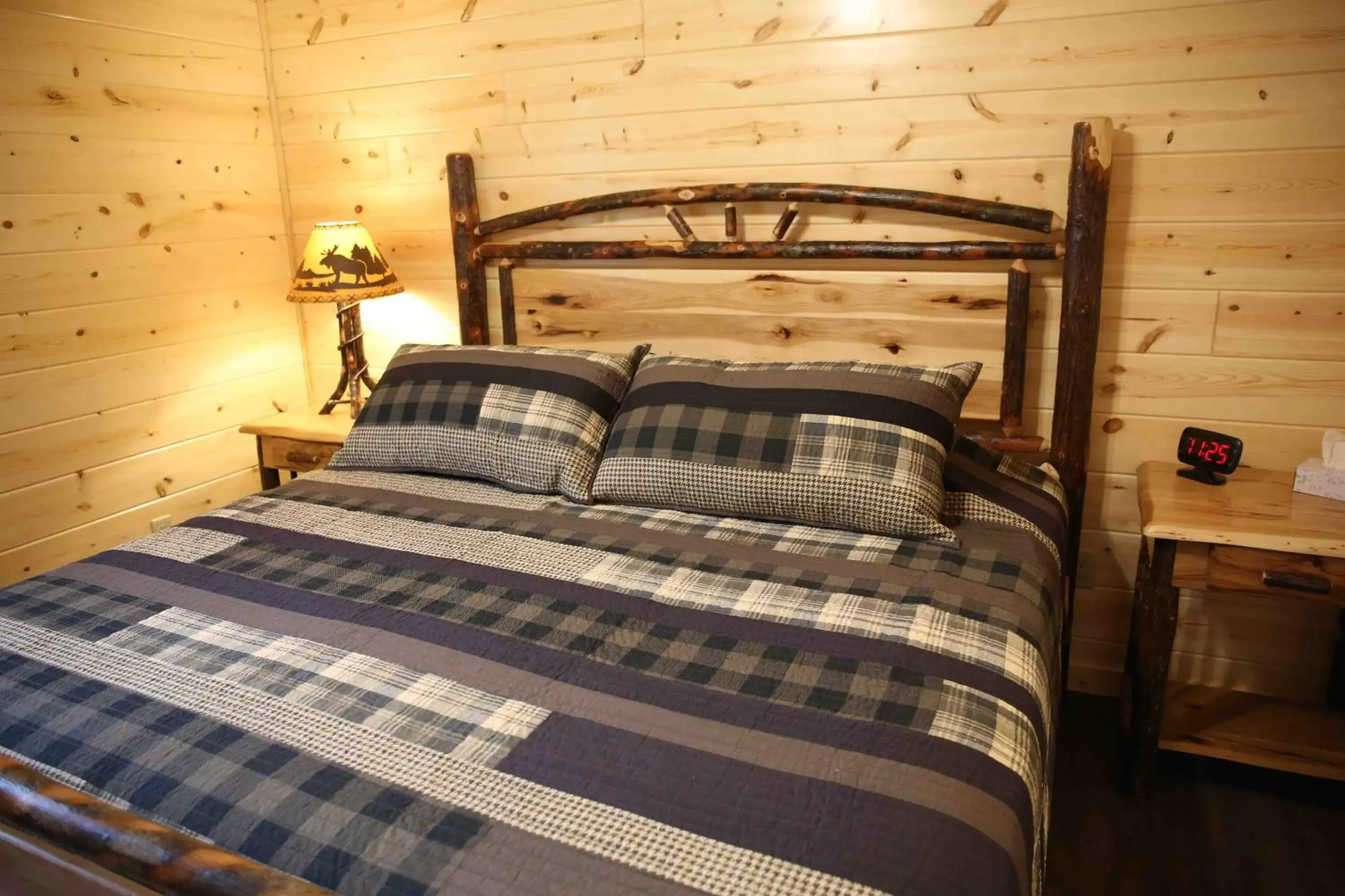 Bed in Blessing Lodge by Amish Country Lodging
