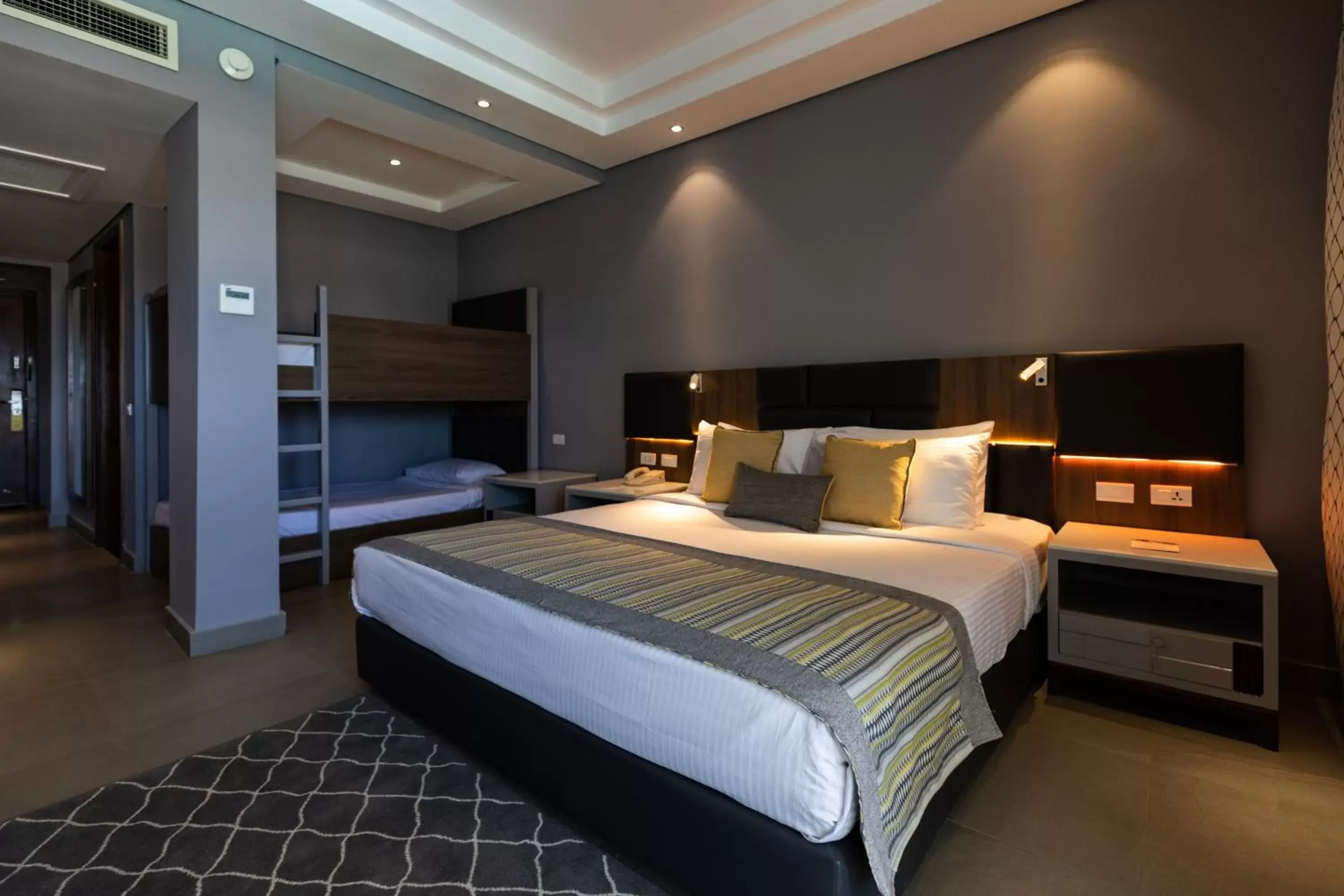 Bedroom, Bed in Sunrise Diamond Beach Resort -Grand Select