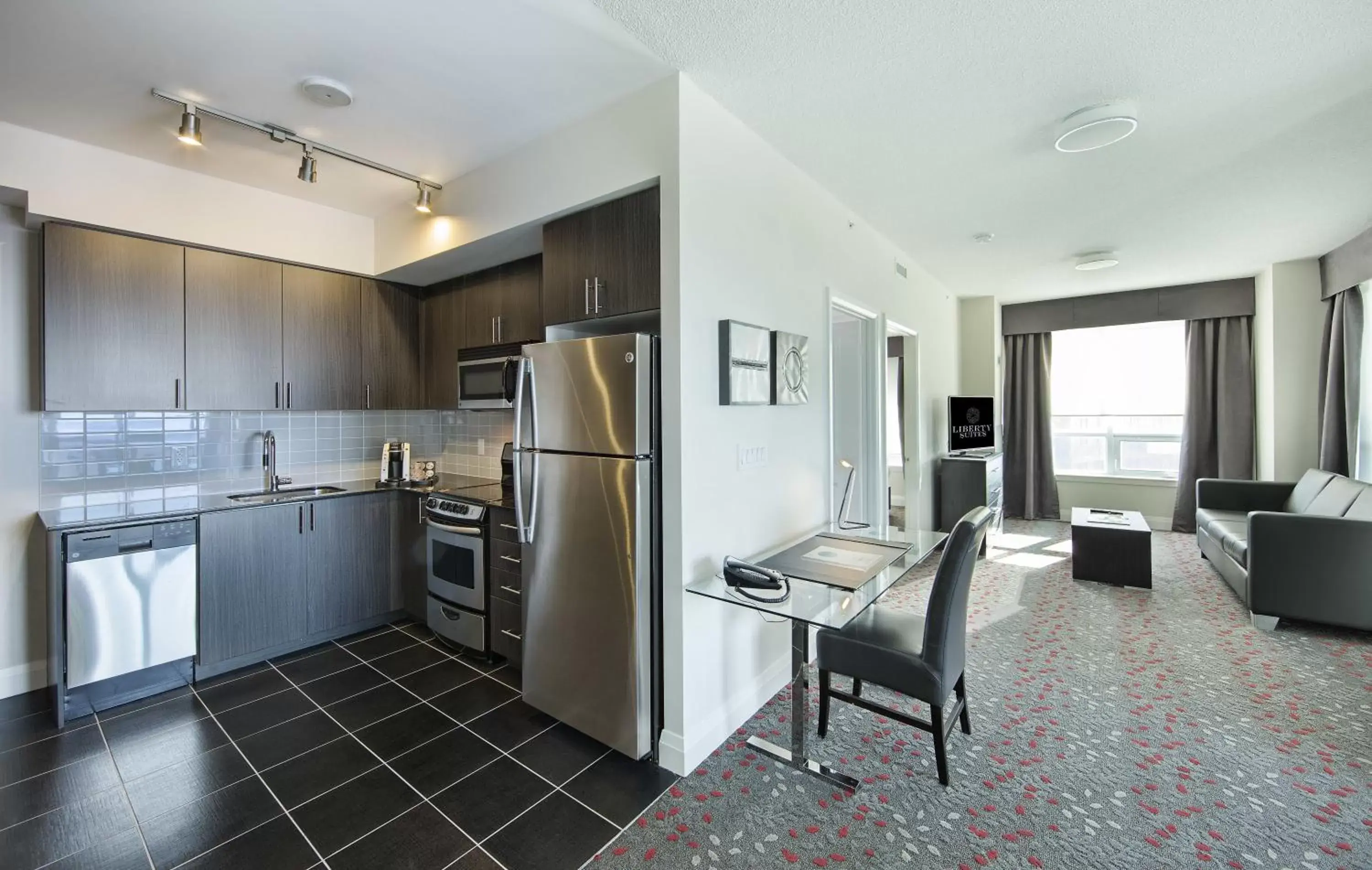 Photo of the whole room, Kitchen/Kitchenette in Liberty Suites