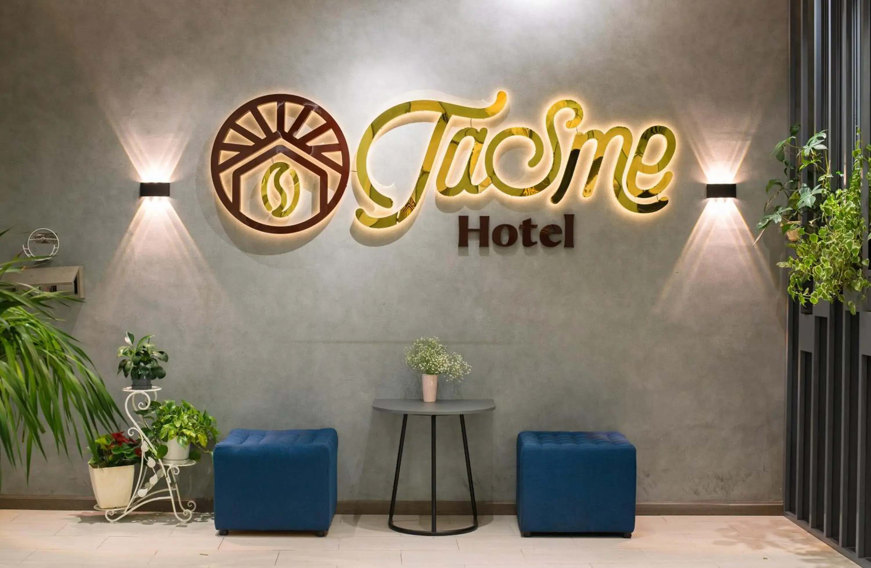 Property logo or sign in Tasme Hotel