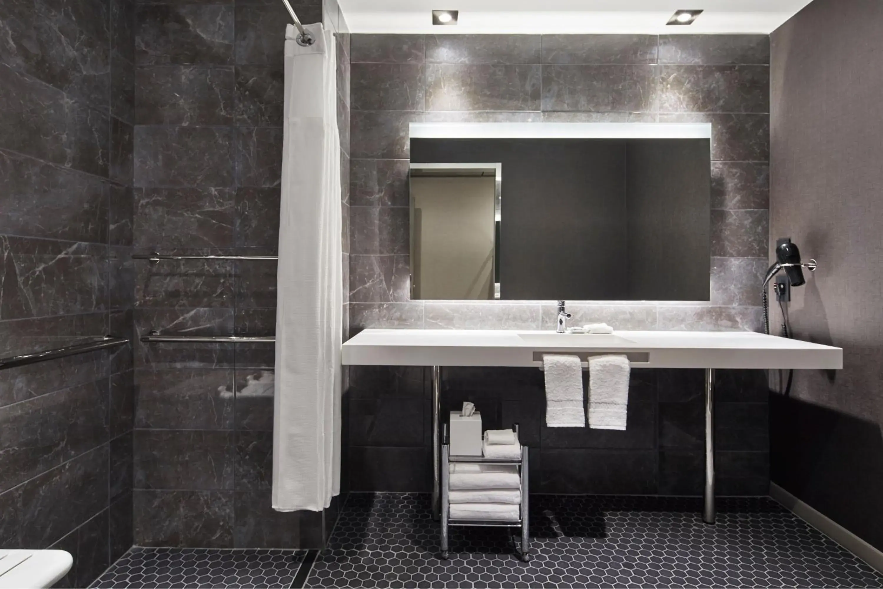 Bathroom in AC Hotel by Marriott Austin Hill Country