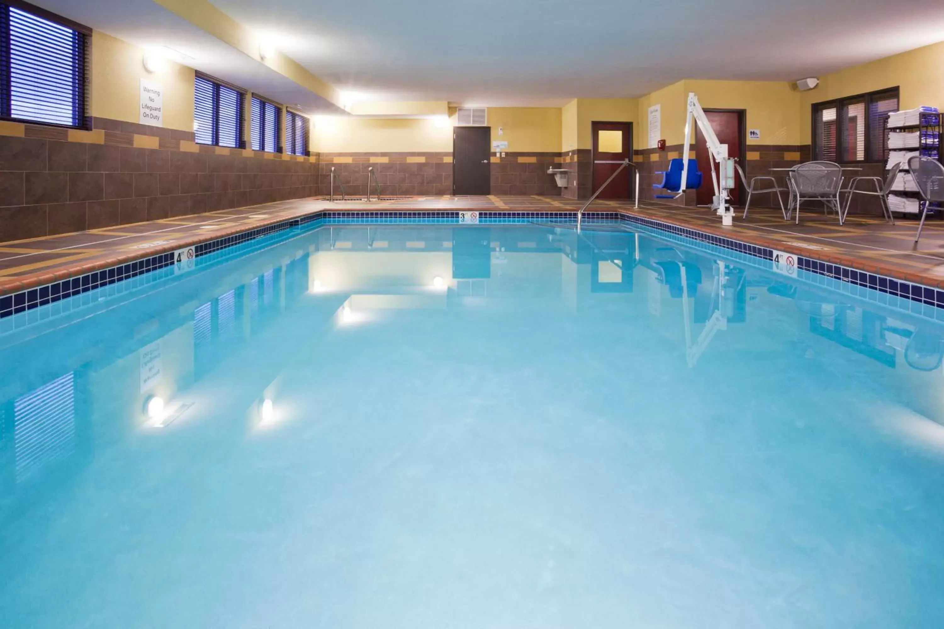 Swimming Pool in Holiday Inn Express and Suites Rochester West-Medical Center, an IHG Hotel