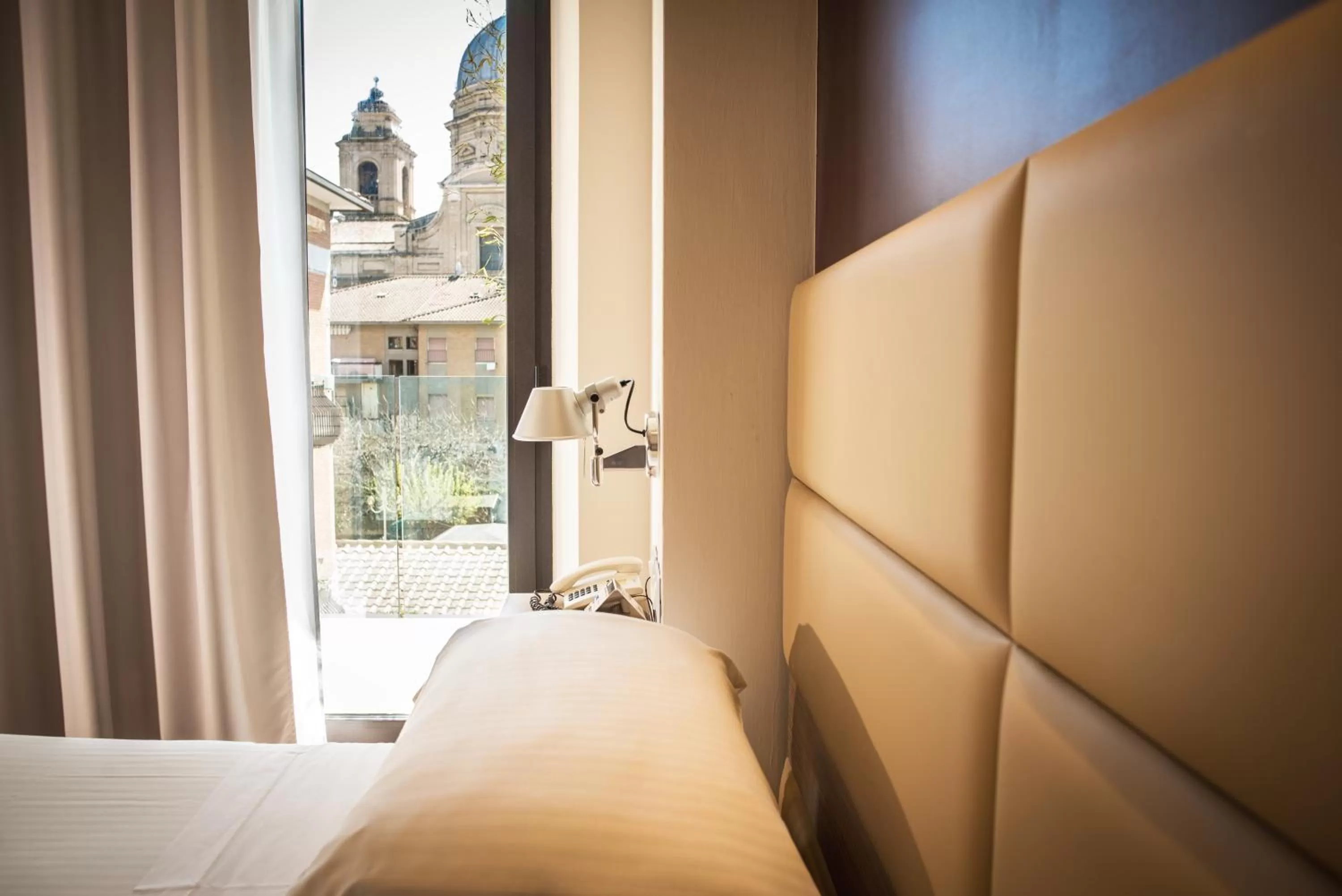 Bed in Dal Moro Gallery Hotel