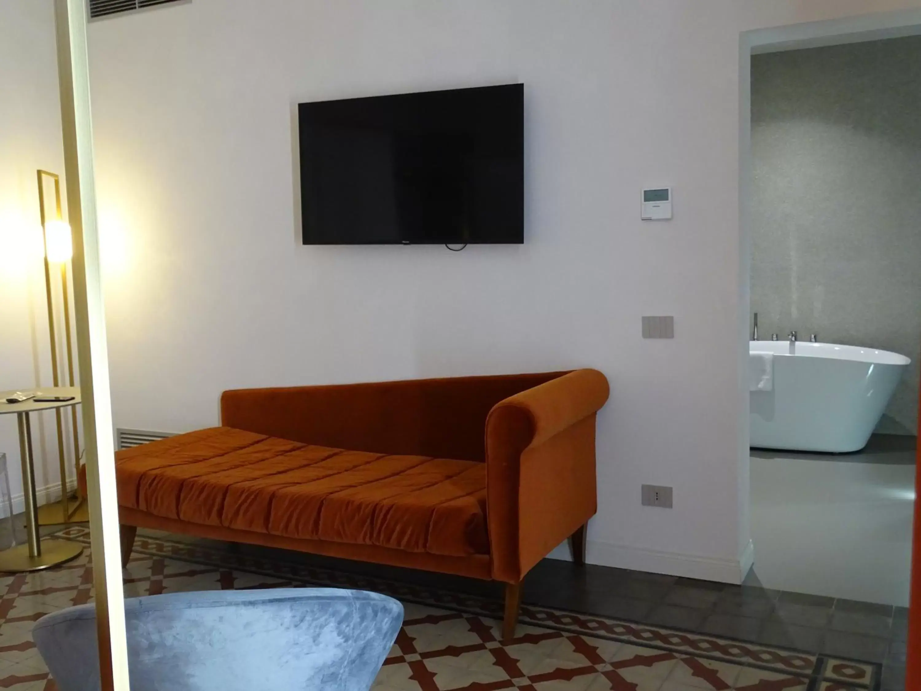 TV and multimedia, TV/Entertainment Center in 20 Miglia Boutique Hotel