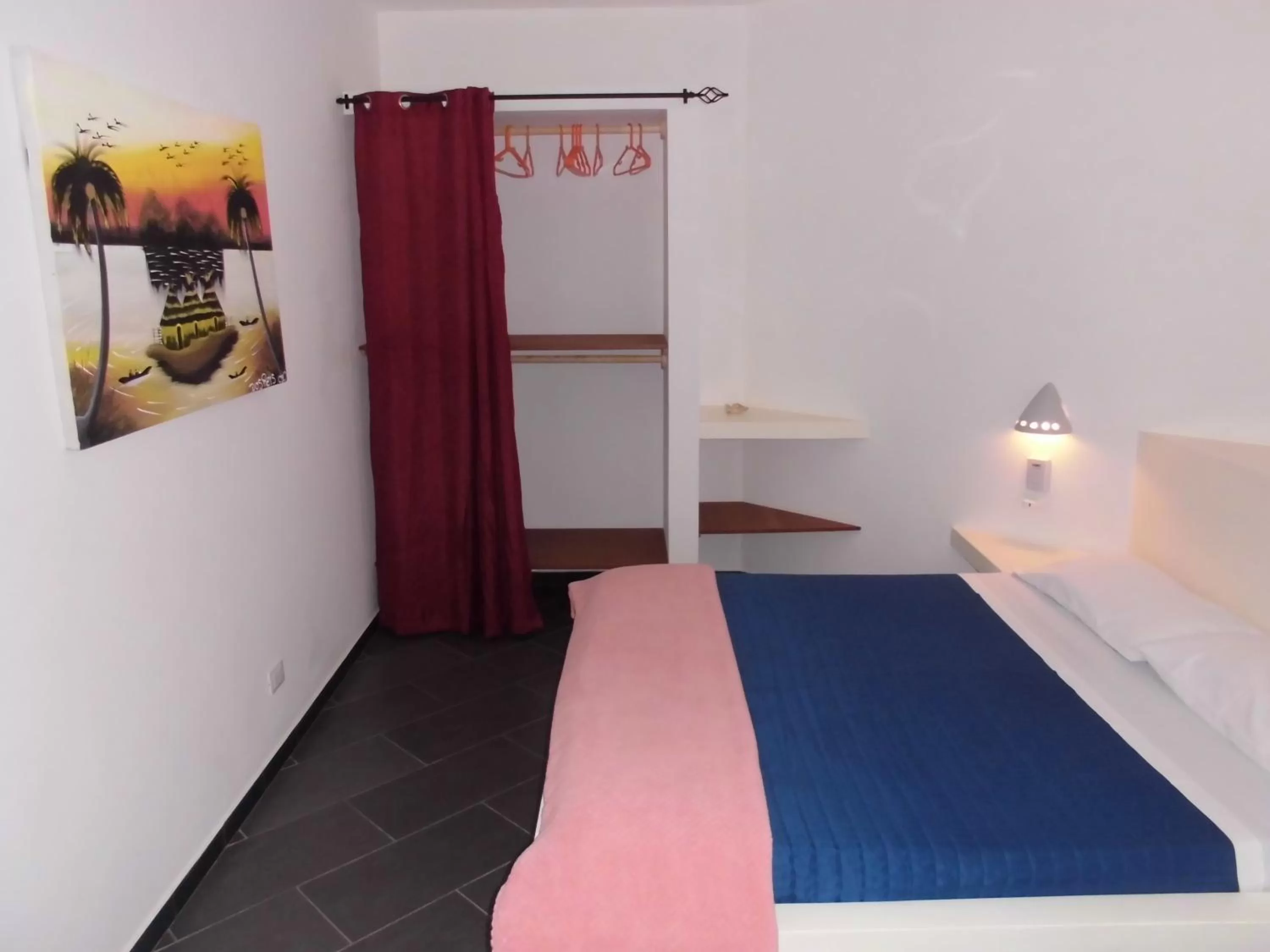 Bed in Cala da Lua apartments